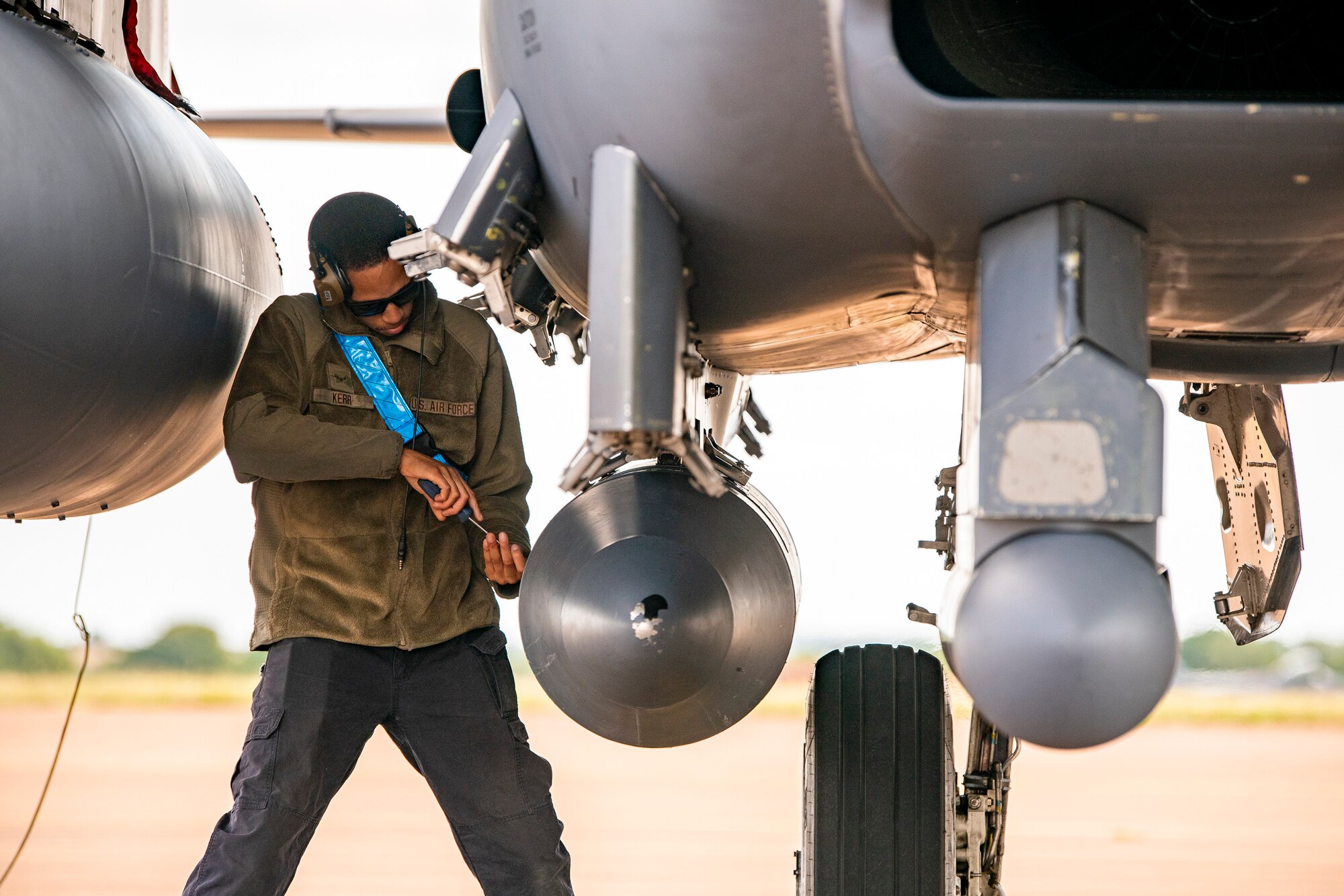 Airman 1st Class Kevaughn Kerr, 48th Aircraft Maintenance Squadron crew chief, performs post-flight checks on a F-15E Strike Eagle after landing during an Agile Combat Employment exercise at RAF Fairford, England, Aug. 23, 2021.  The exercise enables U.S. forces in Europe to operate from locations with varying levels of capacity and support. This further ensures Airmen and aircrews are postured to deliver lethal combat power across the full spectrum of military operations. (U.S. Air Force photo by Senior Airman Eugene Oliver)