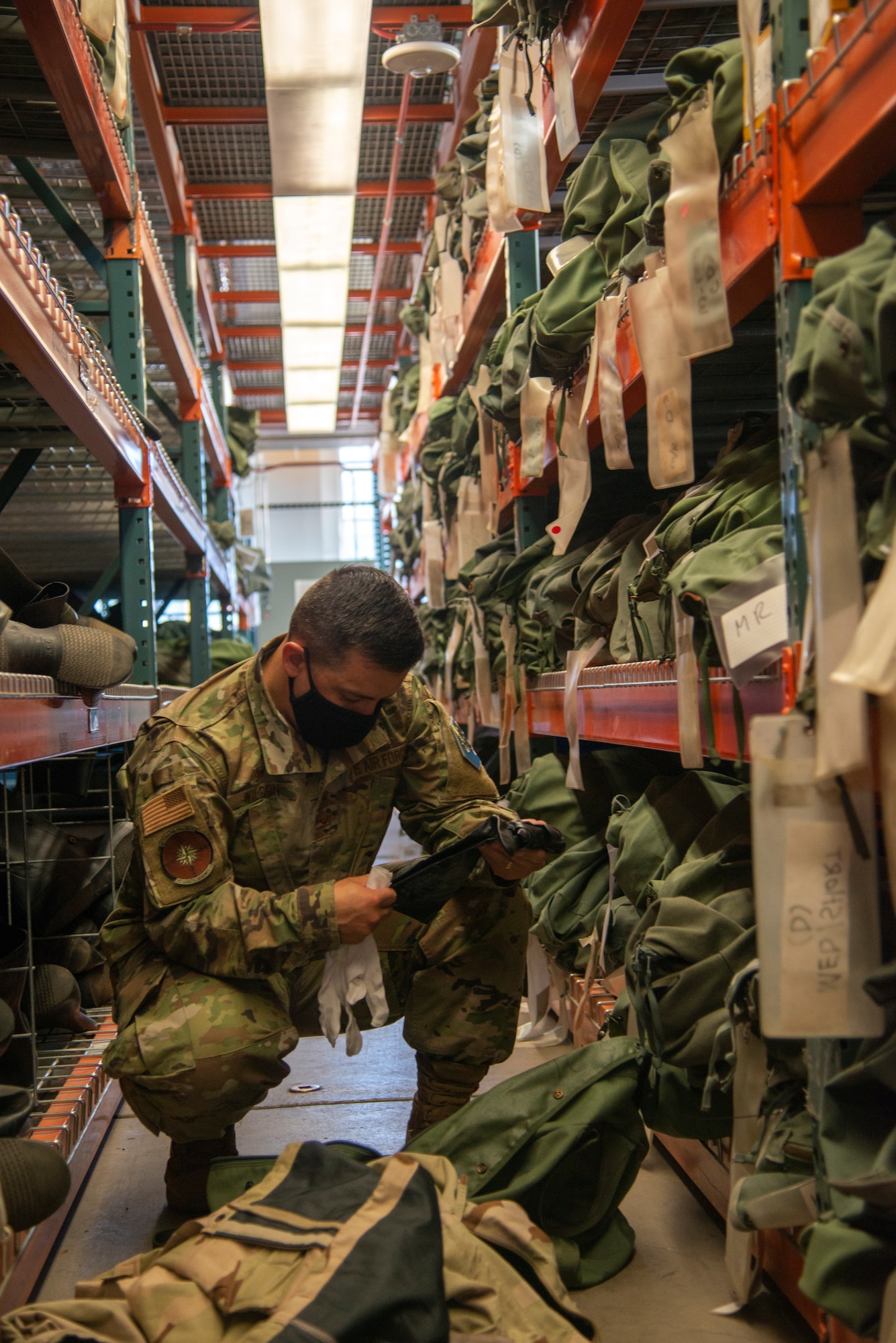Col. Wilson looks at deployment gear