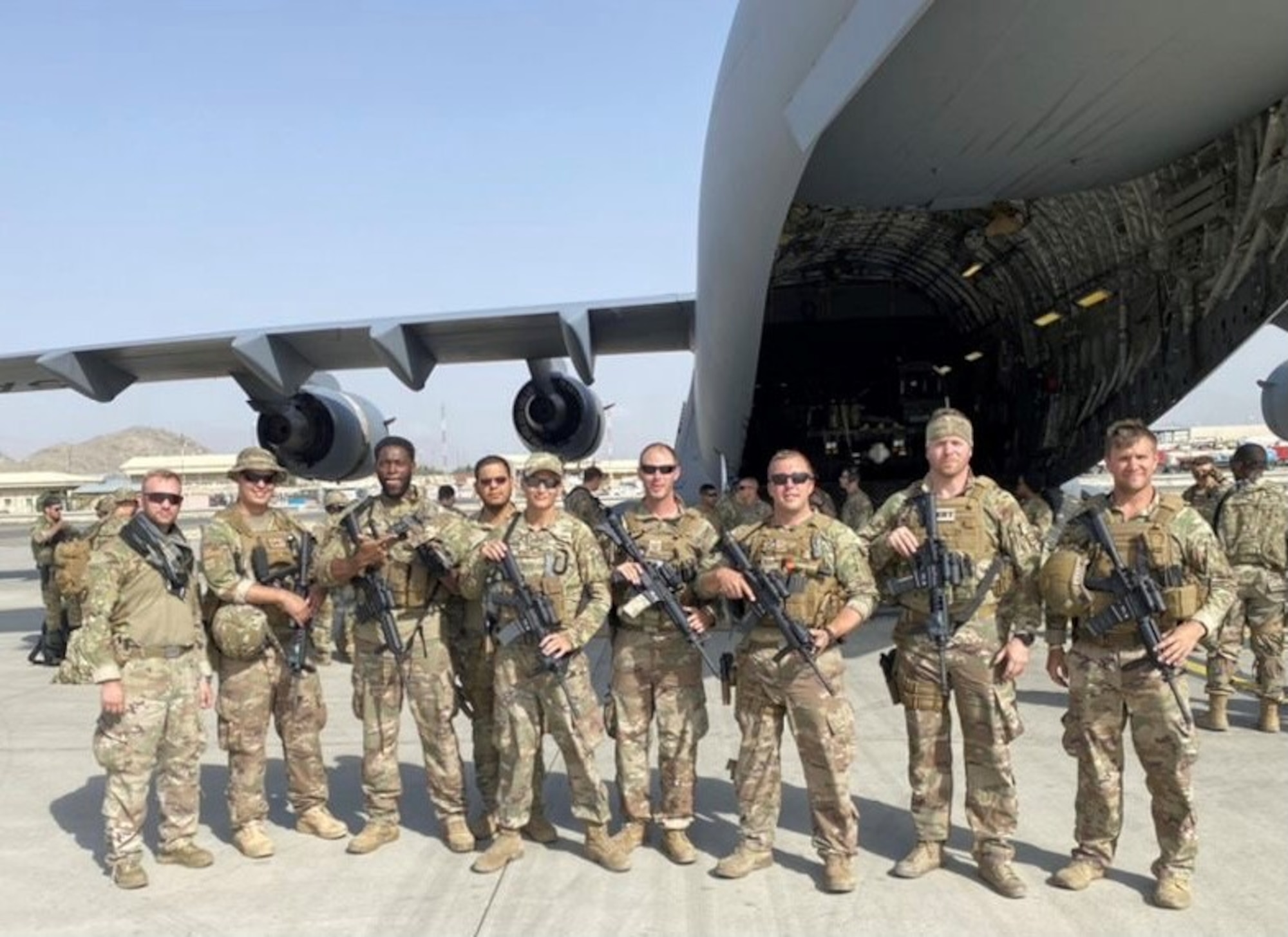 Department of Defense personnel, including Airmen from the 80th Aerial Port Squadron, Dobbins Air Reserve Base, Georgia, conclude support to operations in Afghanistan, August 2021.