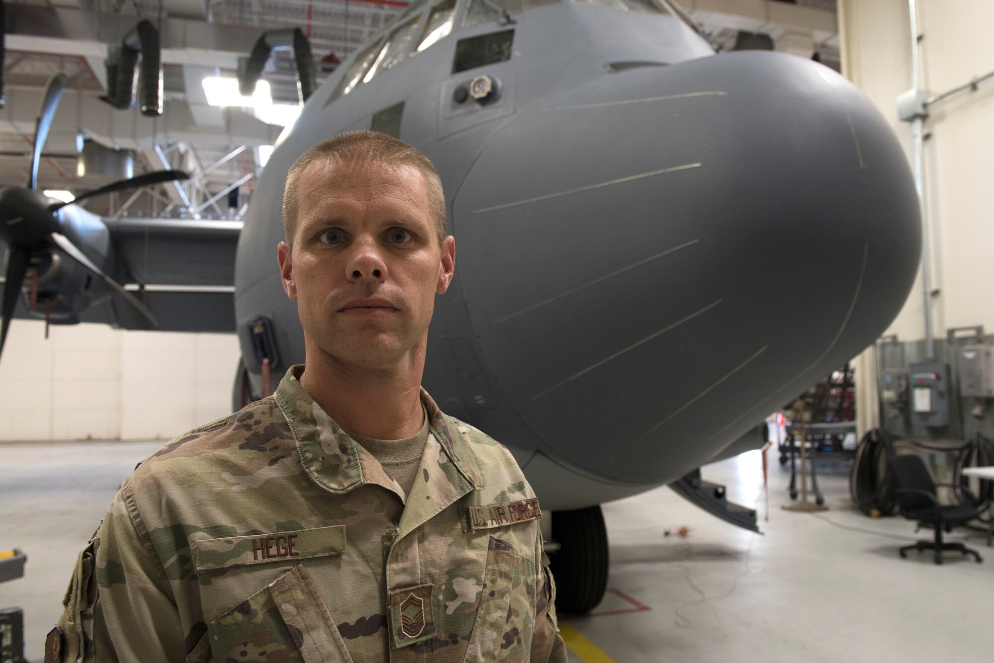 Senior Master Sgt. Shaun Hege, 193rd Equipment Maintenance Superintendent, stands in front of an EC-130J Super J aircraft as he reflects on his memories from Sept. 11, 2001. (U.S. Air National Guard photo by Master Sgt. Matt Schwartz)