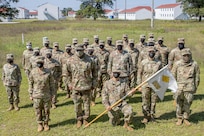 Sgt. Maj. Darnell Cabell, senior enlisted leader and principle advisor to the military deputy to the Assistant Secretary of the Army for Financial Management and Comptroller, poses for a photo with Soldiers from the 326th Financial Management Support Center, during a visit to a Diamond Saber exercise at Fort McCoy, Wisconsin, Aug. 17, 2021. Diamond Saber is a U.S. Army Reserve-led exercise that incorporates all Army components and joint services, and it prepares finance and comptroller Soldiers on warfighting functions such as funding the force, payment support, disbursing operations, accounting, fiscal stewardship, auditability and data analytics. (U.S. Army photo by Mark R. W. Orders-Woempner)