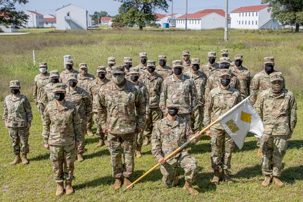 Sgt. Maj. Darnell Cabell, senior enlisted leader and principle advisor to the military deputy to the Assistant Secretary of the Army for Financial Management and Comptroller, poses for a photo with Soldiers from the 326th Financial Management Support Center, during a visit to a Diamond Saber exercise at Fort McCoy, Wisconsin, Aug. 17, 2021. Diamond Saber is a U.S. Army Reserve-led exercise that incorporates all Army components and joint services, and it prepares finance and comptroller Soldiers on warfighting functions such as funding the force, payment support, disbursing operations, accounting, fiscal stewardship, auditability and data analytics. (U.S. Army photo by Mark R. W. Orders-Woempner)