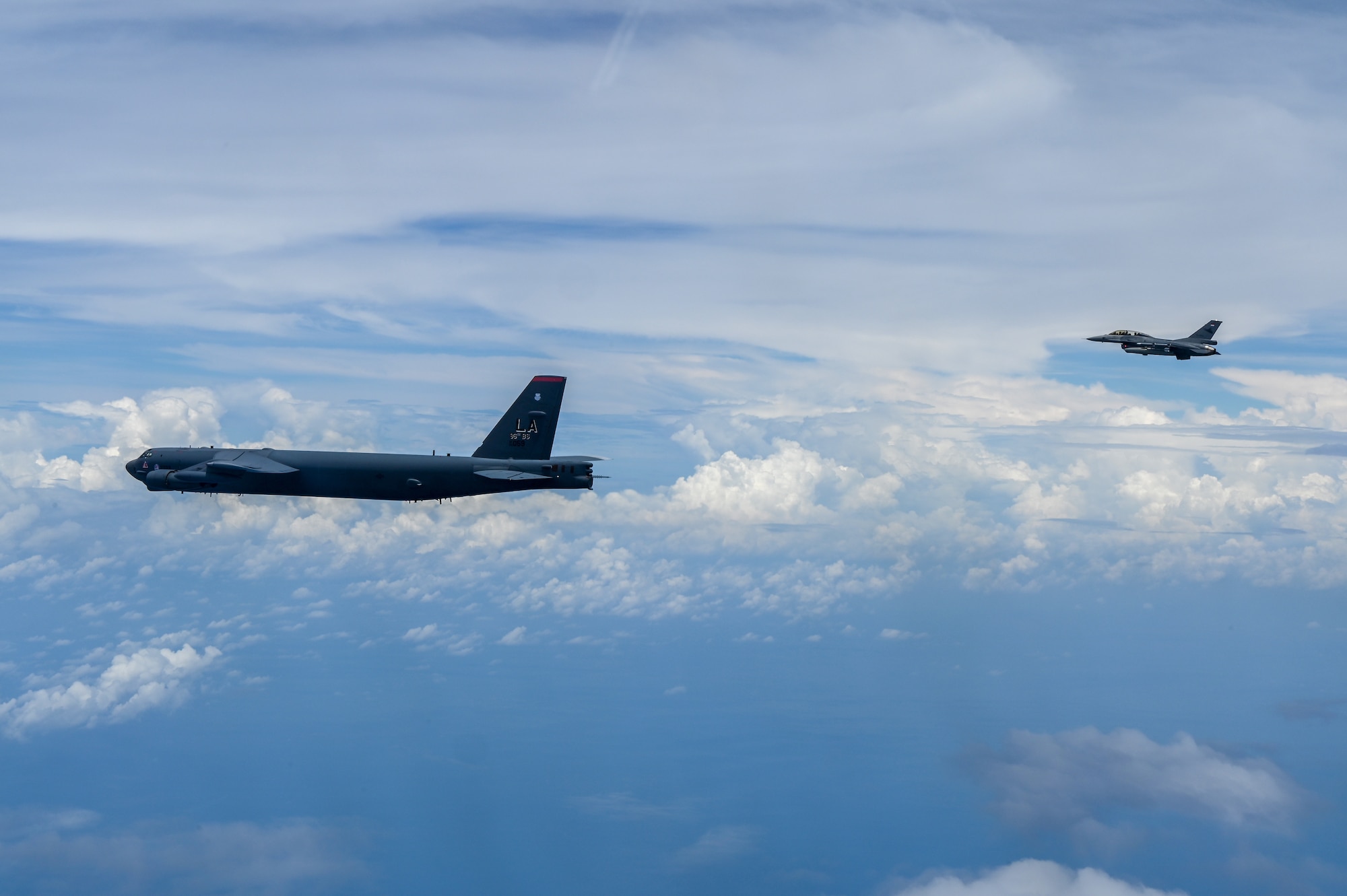 A U.S. Air Force B-52 Stratofortress assigned to the 2nd Bomb Wing, Barksdale Air Force Base, Louisiana, performs aerial operations during a Bomber Task Force deployment in the Indo-Pacific region, Sept. 1, 2021. This is the first time a B-52 has integrated with the Indonesian Air Force during flight. This deployment allows aircrews and support personnel to conduct theater integration and to improve bomber interoperability with allies and partners. (U.S. Air Force photo by Tech. Sgt. Matthew Lotz)