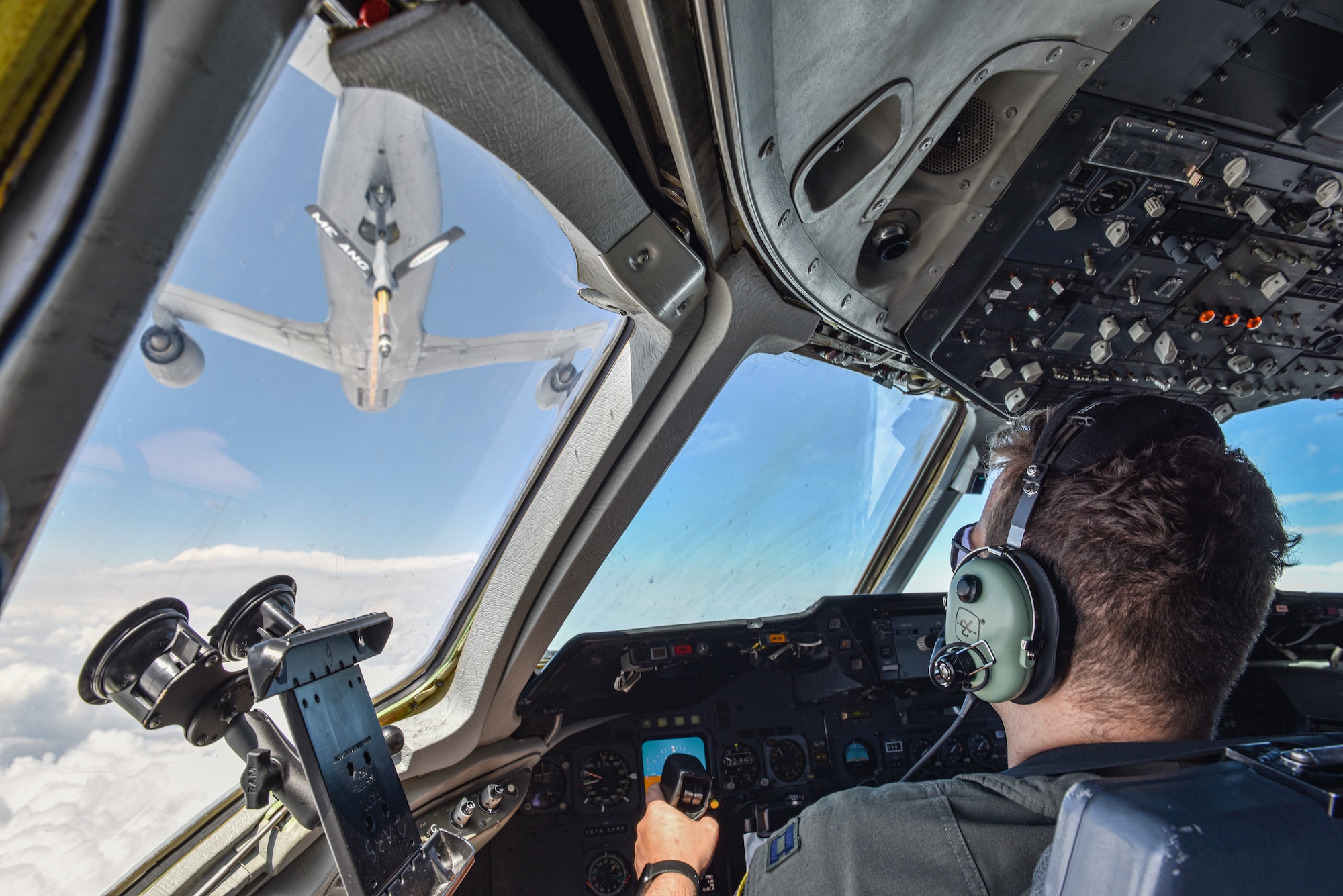 U.S. Air Force Capt. David Crowley, 78th Air Refueling Squadron pilot and 305th Operations Support Squadron Formal Training Unit student, prepares to receive fuel from a KC-135 Stratotanker. Aerial refueling is the process of fuel transfer from one aircraft to another mid-flight, which saves aircrew from having to land and lose time during missions.