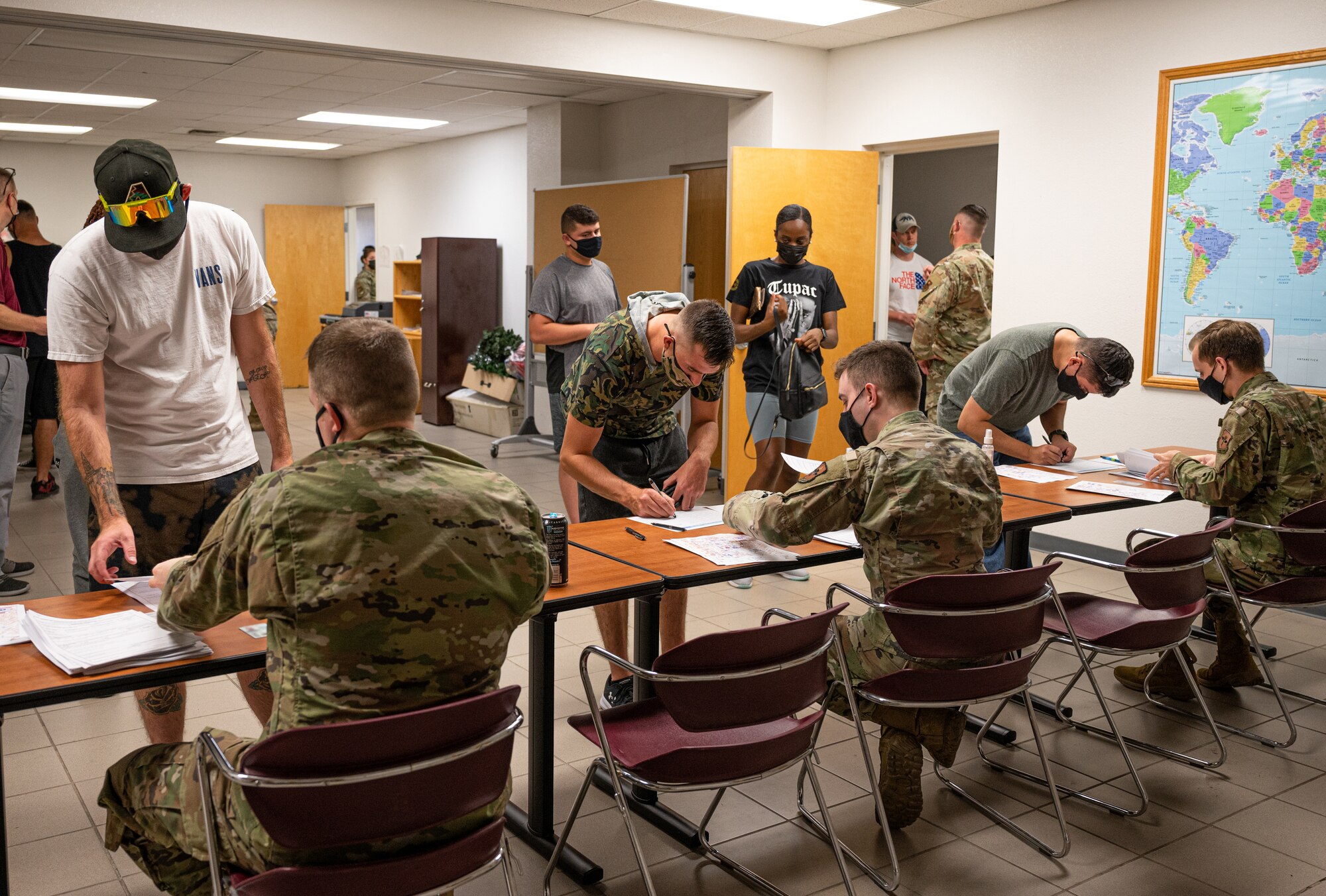 U.S. Air Force Airmen from the 56th Fighter Wing complete deployment out-processing Aug. 30, 2021, at Luke Air Force Base, Arizona. More than 70 Luke AFB Airmen deployed to Holloman AFB, New Mexico, in support of Operation Allies Welcome. The operation supports the temporary provision of medical screening, lodging, and other general support for Afghan evacuees and their families arriving to several military installations in the United States.  (U.S. Air Force photo by Senior Airman Leala Marquez)