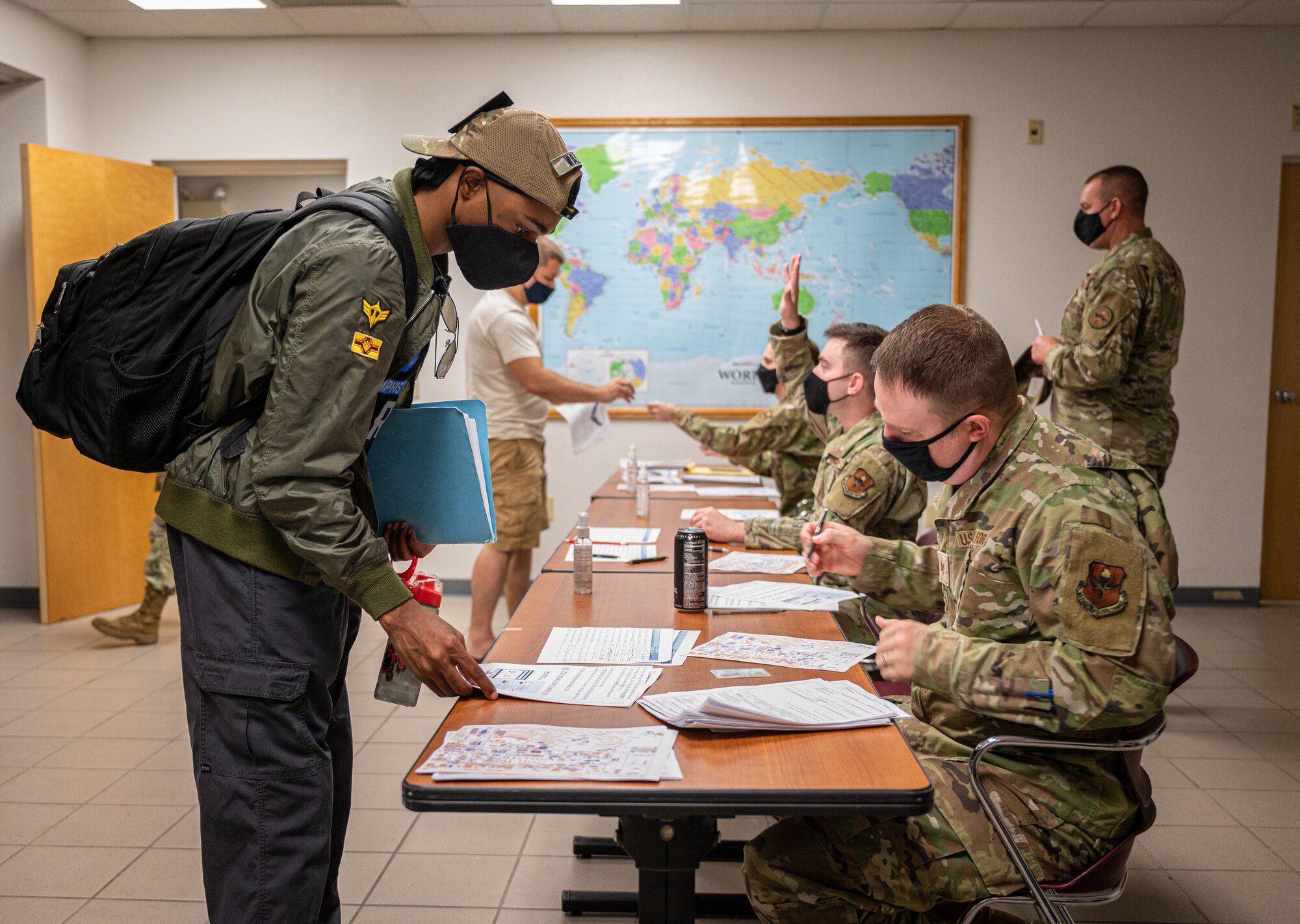 U.S. Air Force Airmen from the 56th Fighter Wing complete deployment outprocessing Aug. 30, 2021, at Luke Air Force Base, Arizona. More than 70 Luke AFB Airmen deployed to Holloman AFB, New Mexico, in support of Operation Allies Welcome. The operation supports the temporary provision of medical screening, lodging, and other general support for Afghan evacuees and their families arriving to several military installations in the United States.  (U.S. Air Force photo by Senior Airman Leala Marquez)