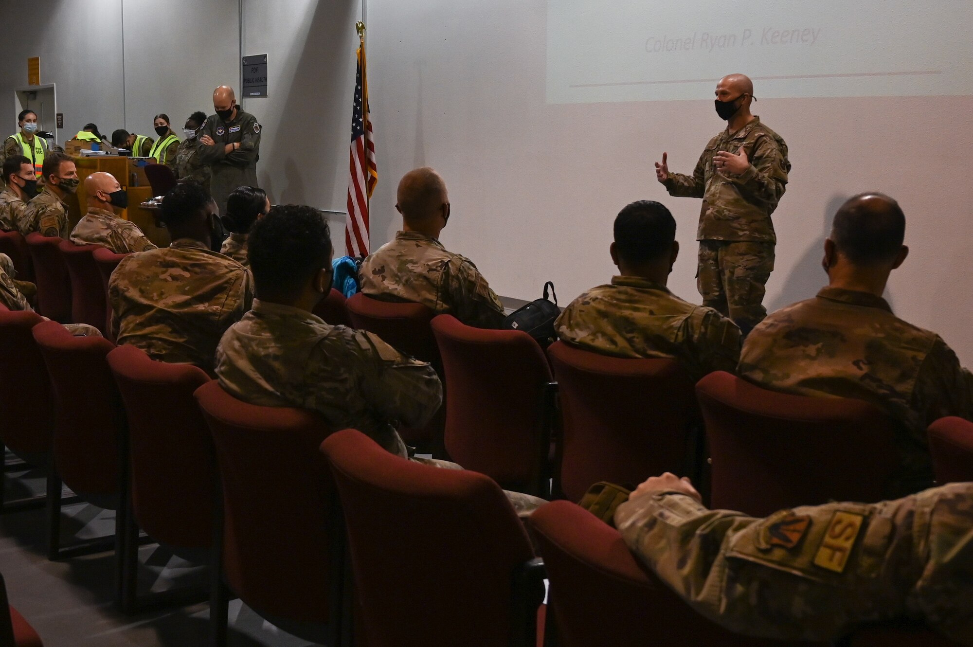 Chief Master Sgt. Thomas Temple, 49th Wing command chief, welcomes Task Force Holloman personnel Aug. 27, 2021 on Holloman Air Force Base, New Mexico. The Department of Defense, through U.S. Northern Command, and in support of the Department of Homeland Security, is providing transportation, temporary housing, medical screening, and general support for up to 50,000 Afghan evacuees at suitable facilities, in permanent or temporary structures, as quickly as possible. This initiative provides Afghan personnel essential support at secure locations outside Afghanistan. (Tech. Sgt. BreeAnn Sachs)