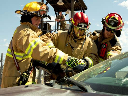 Airmen use heavy equipment