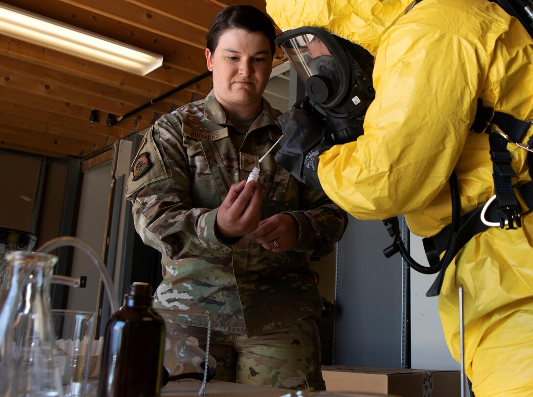 Airmen go through procedures of testing unknown substances