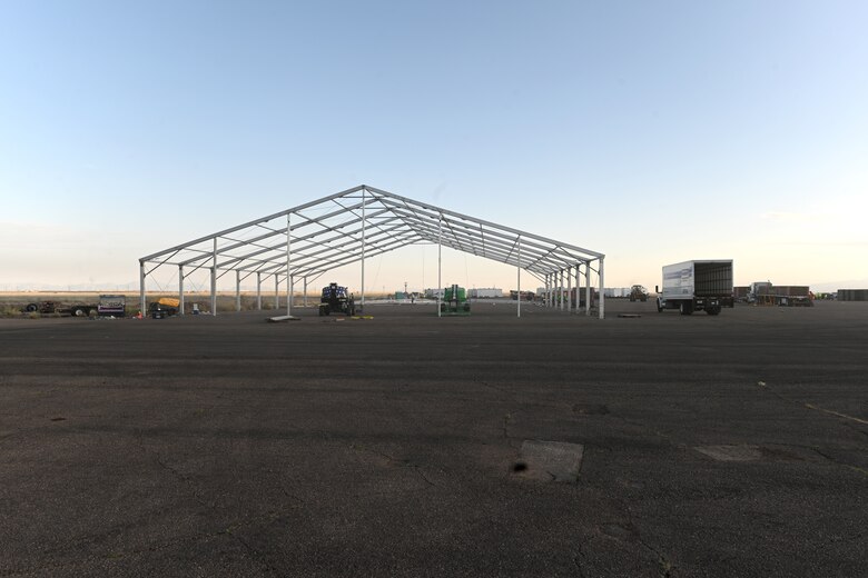 The framework of a future Afghan personnel housing facility be seen during construction in support of Operation Allies Welcome, Aug. 29, 2021, on Holloman Air Force Base, New Mexico. The Department of Defense, through U.S. Northern Command, and in support of the Department of Homeland Security, is providing transportation, temporary housing, medical screening, and general support for up to 50,000 Afghan evacuees at suitable facilities, in permanent or temporary structures, as quickly as possible. This initiative provides Afghan personnel essential support at secure locations outside Afghanistan. (U.S. Air Force photo by Staff Sgt. Christopher S. Sparks)