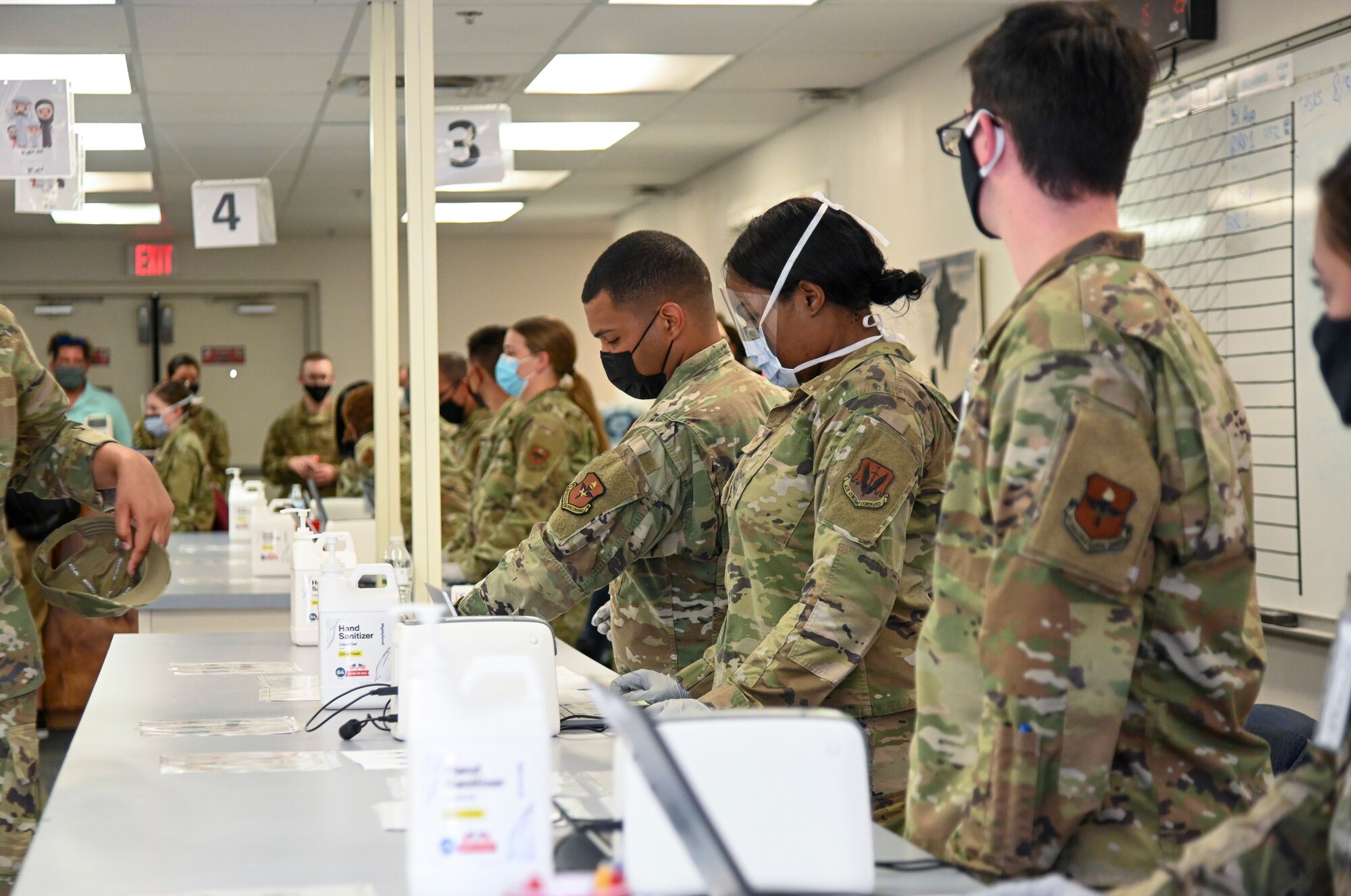 Airmen assigned to Task Force - Holloman prepare an in-processing line in support of Operation Allies Welcome, Aug. 31, 2021, on Holloman Air Force Base, New Mexico. The Department of Defense, through U.S. Northern Command, and in support of the Department of Homeland Security, is providing transportation, temporary housing, medical screening, and general support for up to 50,000 Afghan evacuees at suitable facilities, in permanent or temporary structures, as quickly as possible. This initiative provides Afghan personnel essential support at secure locations outside Afghanistan. (U.S. Air Force photo by Airman 1st Class Jessica Sanchez-Chen)