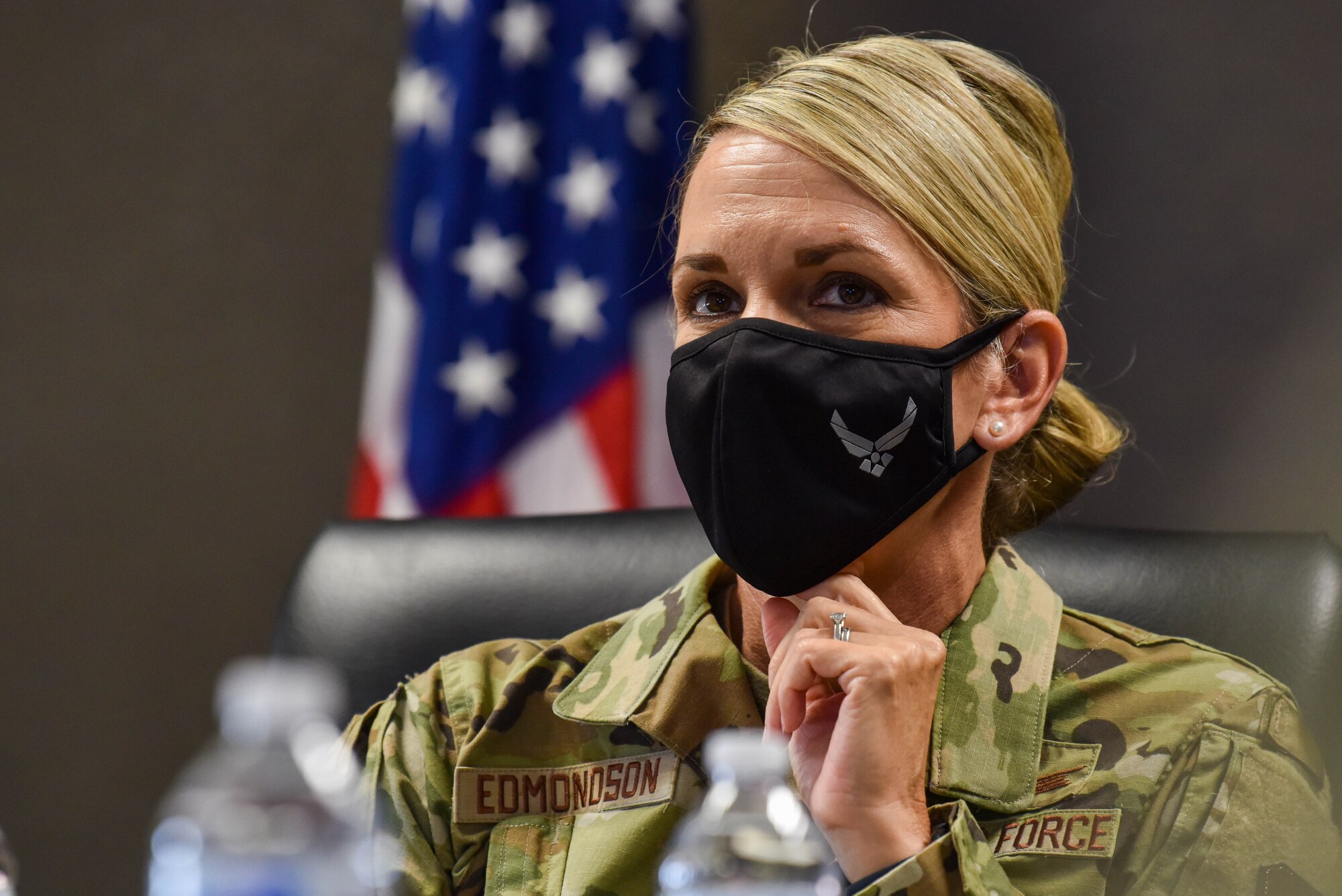 2nd Air Force commander, attends a briefing.