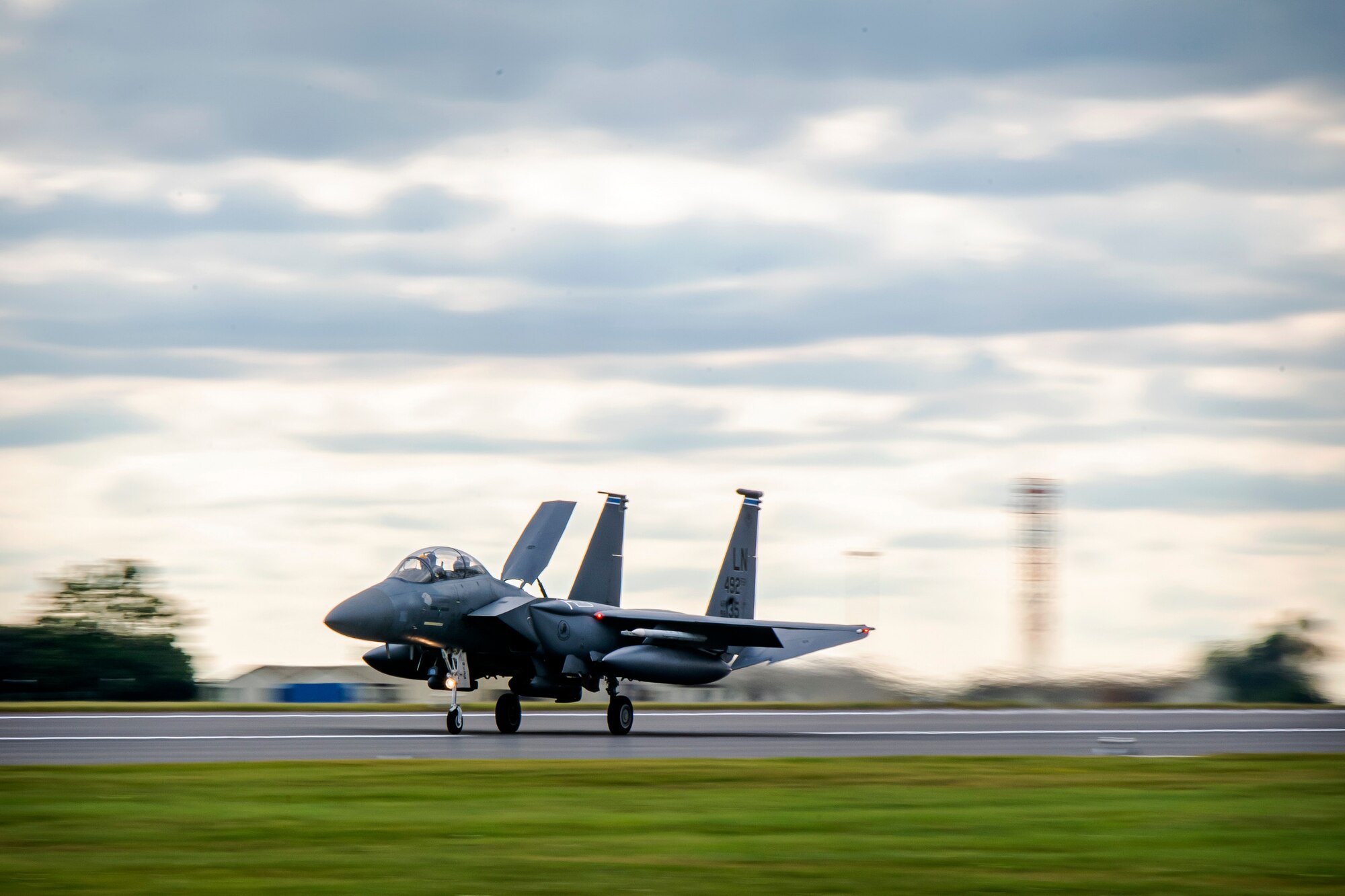 An F-15E Strike Eagle assigned to the 492d Fighter Squadron, flies overhead during an Agile Combat Employment exercise at RAF Fairford, England, Aug. 25, 2021.Utilizing ACE concepts ensures that U.S. forces in Europe are better equipped to operate from locations with varying levels of capacity and support to accomplish the mission. This further ensures Airmen and aircrews are postured to deliver lethal combat power across the full spectrum of military operations. (U.S. Air Force photo by Senior Airman Eugene Oliver)