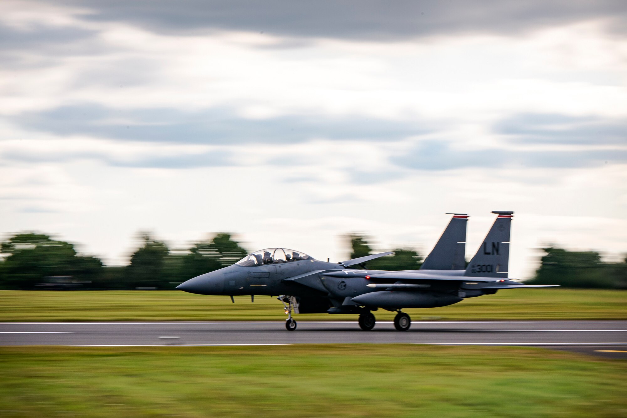 An F-15E Strike Eagle assigned to the 492d Fighter Squadron, lands during an Agile Combat Employment exercise at RAF Fairford, England, Aug. 25, 2021. The exercise enables U.S. forces in Europe to operate from locations with varying levels of capacity and support. This further ensures Airmen and aircrews are postured to deliver lethal combat power across the full spectrum of military operations. (U.S. Air Force photo by Senior Airman Eugene Oliver)