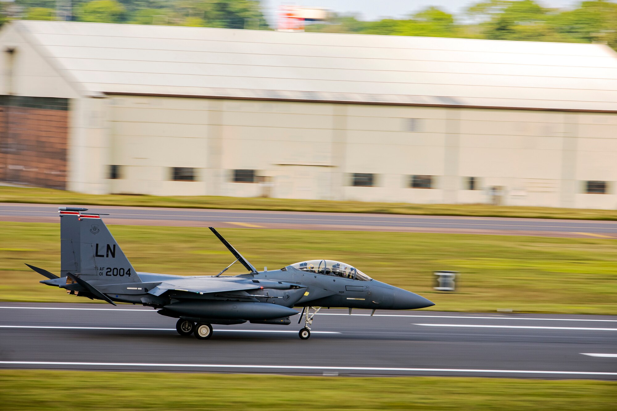 An F-15E Strike Eagle assigned to the 492d Fighter Squadron, flies overhead during an Agile Combat Employment exercise at RAF Fairford, England, Aug. 23, 2021.Utilizing ACE concepts ensures that U.S. forces in Europe are better equipped to operate from locations with varying levels of capacity and support to accomplish the mission. This further ensures Airmen and aircrews are postured to deliver lethal combat power across the full spectrum of military operations. (U.S. Air Force photo by Senior Airman Eugene Oliver)