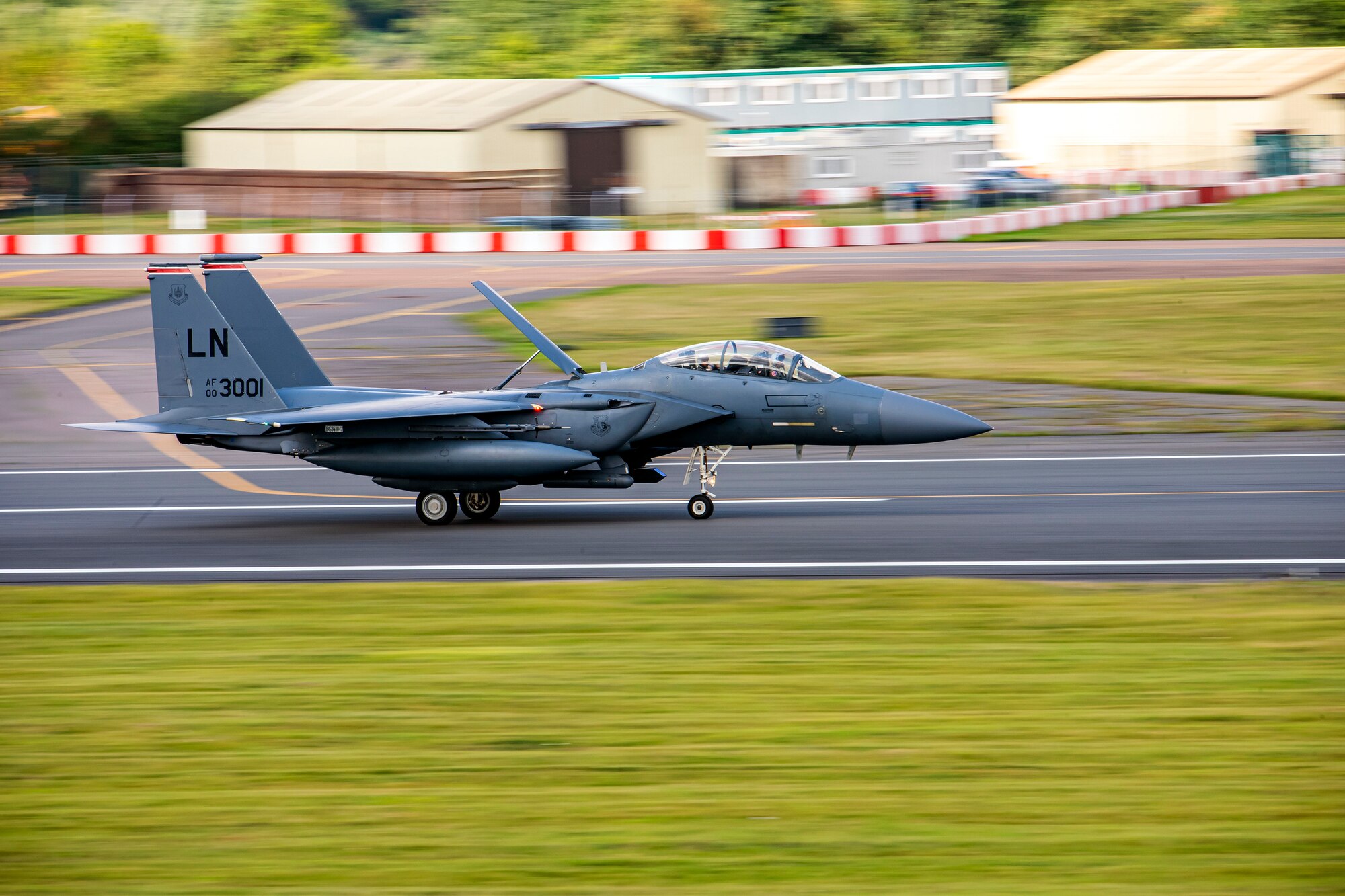 An F-15E Strike Eagle assigned to the 492d Fighter Squadron, flies overhead during an Agile Combat Employment exercise at RAF Fairford, England, Aug. 23, 2021.Utilizing ACE concepts ensures that U.S. forces in Europe are better equipped to operate from locations with varying levels of capacity and support to accomplish the mission. This further ensures Airmen and aircrews are postured to deliver lethal combat power across the full spectrum of military operations. (U.S. Air Force photo by Senior Airman Eugene Oliver)