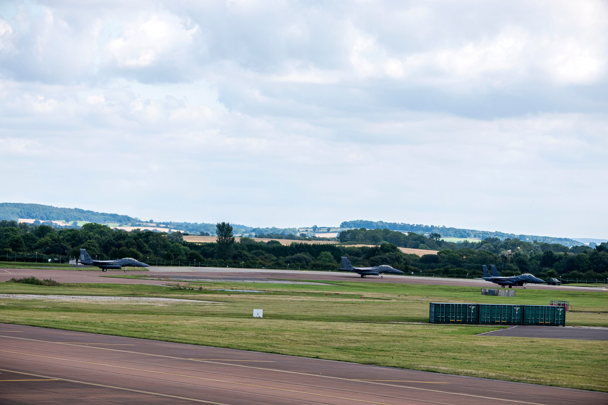 Three F-15E Strike Eagles assigned to the 492d Fighter Squadron, taxi on the runway during an Agile Combat Employment exercise at RAF Fairford, England, Aug. 23, 2021. The exercise enables U.S. forces in Europe to operate from locations with varying levels of capacity and support. This further ensures Airmen and aircrews are postured to deliver lethal combat power across the full spectrum of military operations. (U.S. Air Force photo by Senior Airman Eugene Oliver)