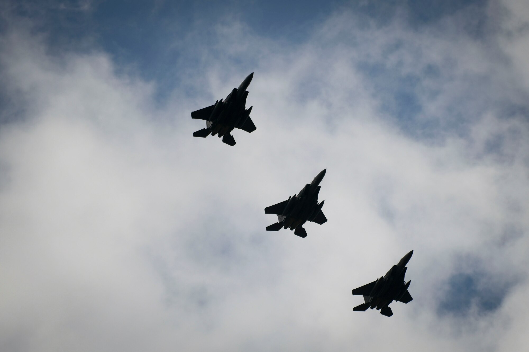 A formation of F-15E Strike Eagles assigned to the 492d Fighter Squadron approach for landing during an Agile Combat Employment exercise at RAF Fairford, England, Aug. 23, 2021. Utilizing ACE concepts ensures U.S. forces in Europe are better equipped to operate from locations that have varying levels of capacity and support to accomplish the mission. (U.S. Air Force photo by Master Sgt. Jeff Andrejcik)