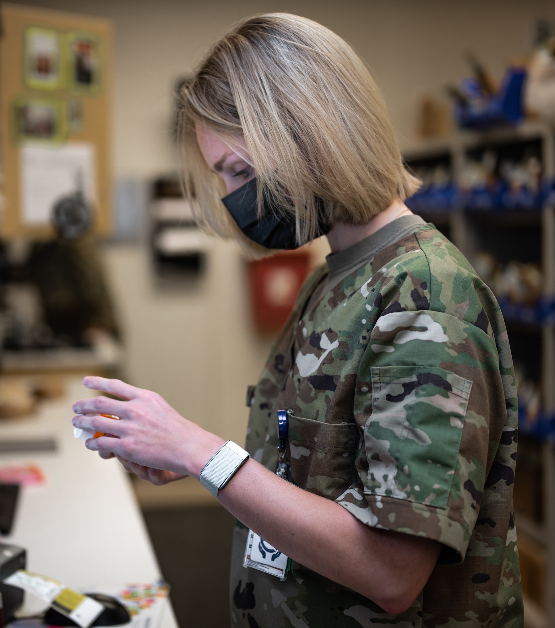 U.S. Air Force Capt. Julie Comitalo, 18th Medical Support Squadron chief of pharmacy, checks medicine before it's delivered to a patient at Kadena Air Base, Japan, Sept. 1, 2021. Air Force pharmacists coordinate with primary health care providers in order to provide appropriate prescriptions to patients. (U.S. Air Force photo by Airman 1st Class Stephen Pulter)