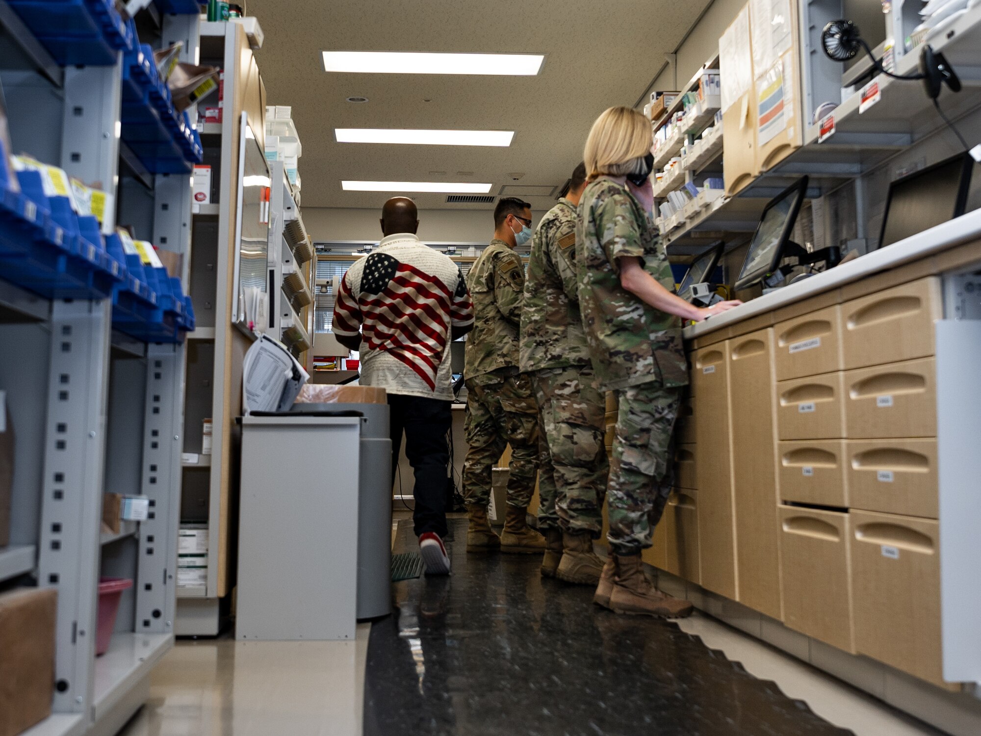 U.S. Air Force Airmen from the 18th Medical Support Squadron, conduct pharmaceutical operations at Kadena Air Base, Japan, Sept. 1, 2021. Whether maintaining an up-to-date flu vaccine or preparing for a temporary duty, the 18th Medical Group has the resources to keep Airmen ready and healthy. (U.S. Air Force photo by Airman 1st Class Stephen Pulter)