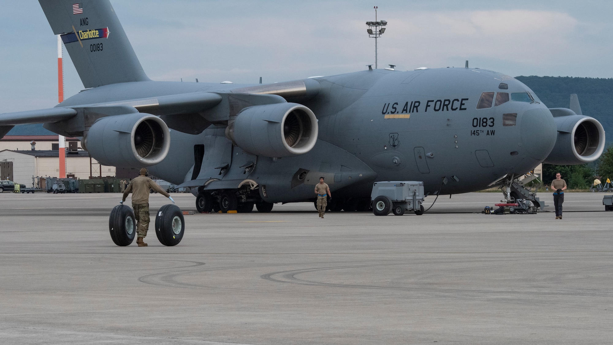 Airmen maintain aircraft.