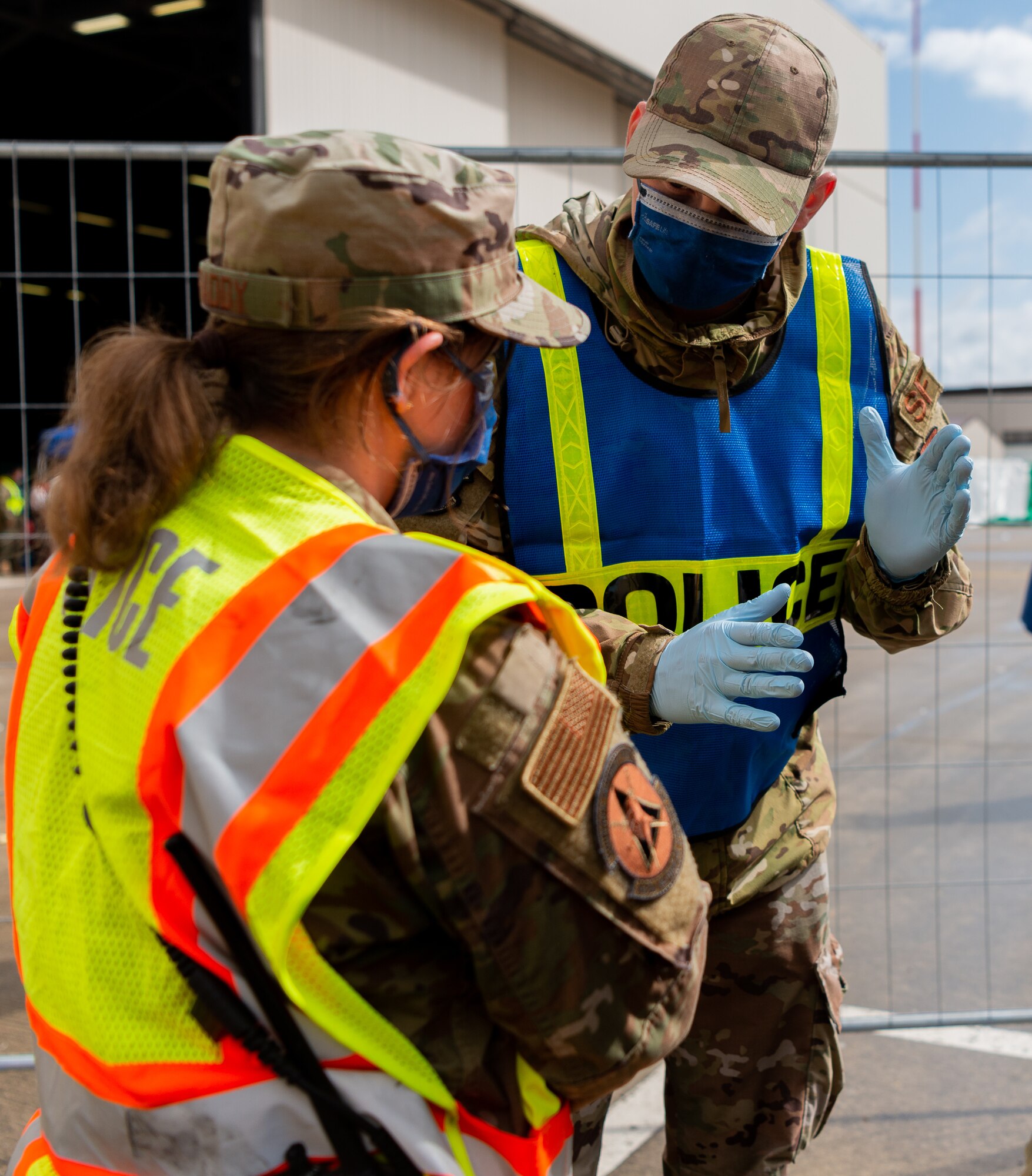 Airman volunteers discuss operations.