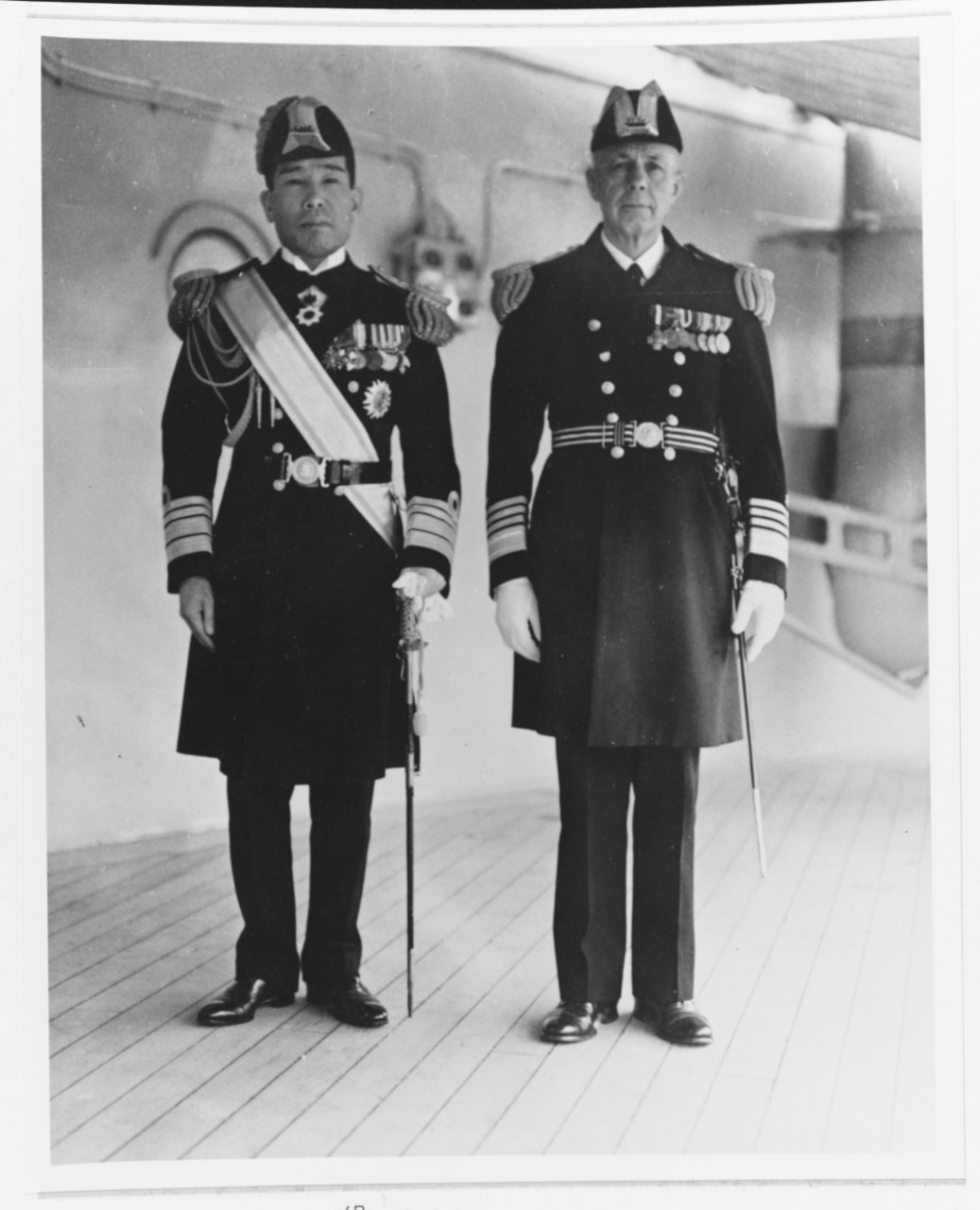 Admiral Harry E. Yarnell, USN, right, with Vice Admiral Kiyoshi Hasegawa, IJN, aboard USS Augusta (CA-31) at Shanghai, China, in May 1937. Hasegawa commanded the Japanese Third Fleet while Yarnell was CINCAF (NH 81617).
