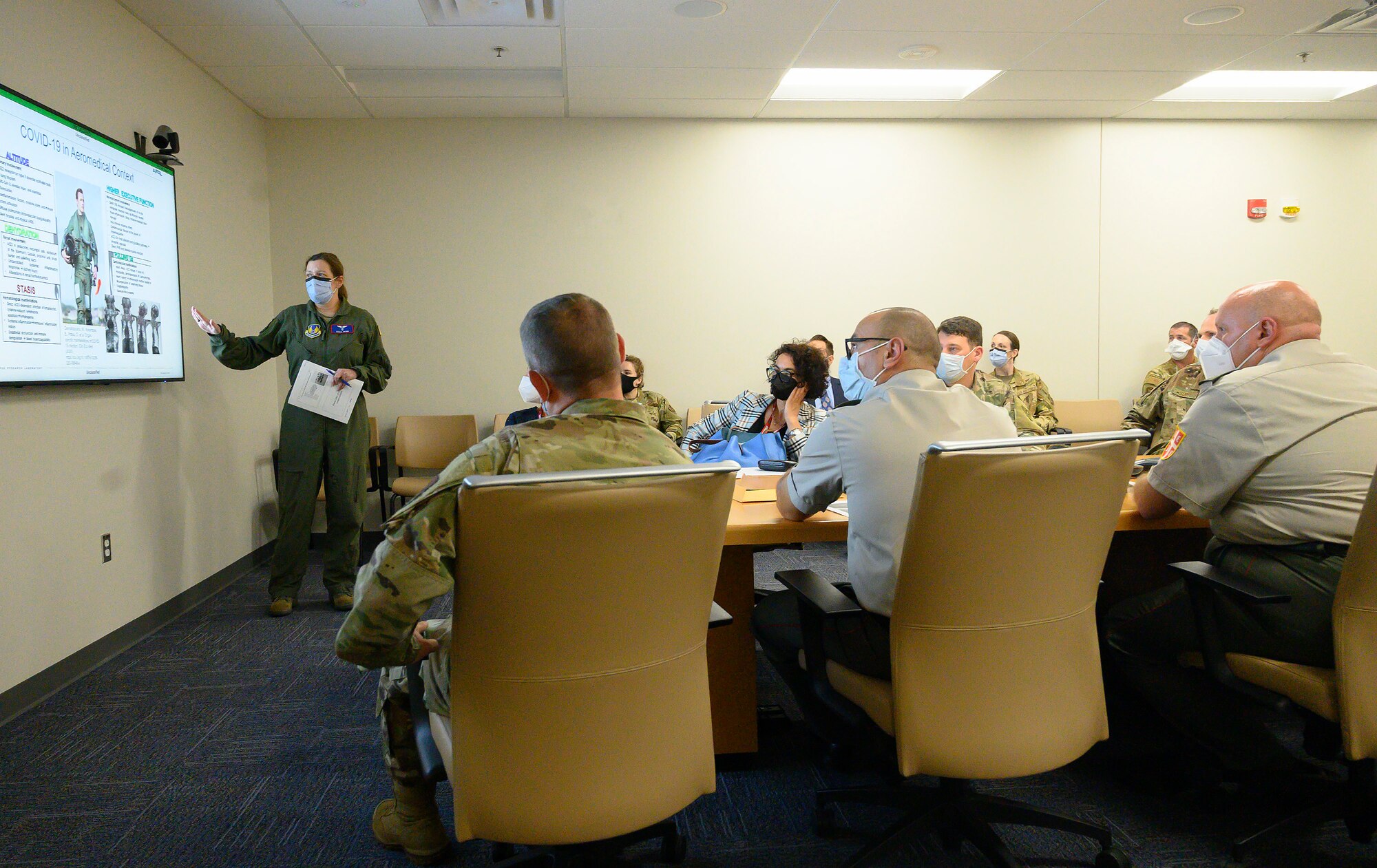 Lt. Col. Dara Regn, U.S. Air Force School of Aerospace Medicine, briefs a Serbian armed forces medical delegation on COVID-19 aeromedical procedures Aug. 19 at Wright-Patterson Air Force Base. The delegation, sponsored by the Ohio National Guard’s State Partnership Program, visited Wright-Patterson Medical Center and the 711th Human Performance Wing to learn best practices in combating COVID-19.