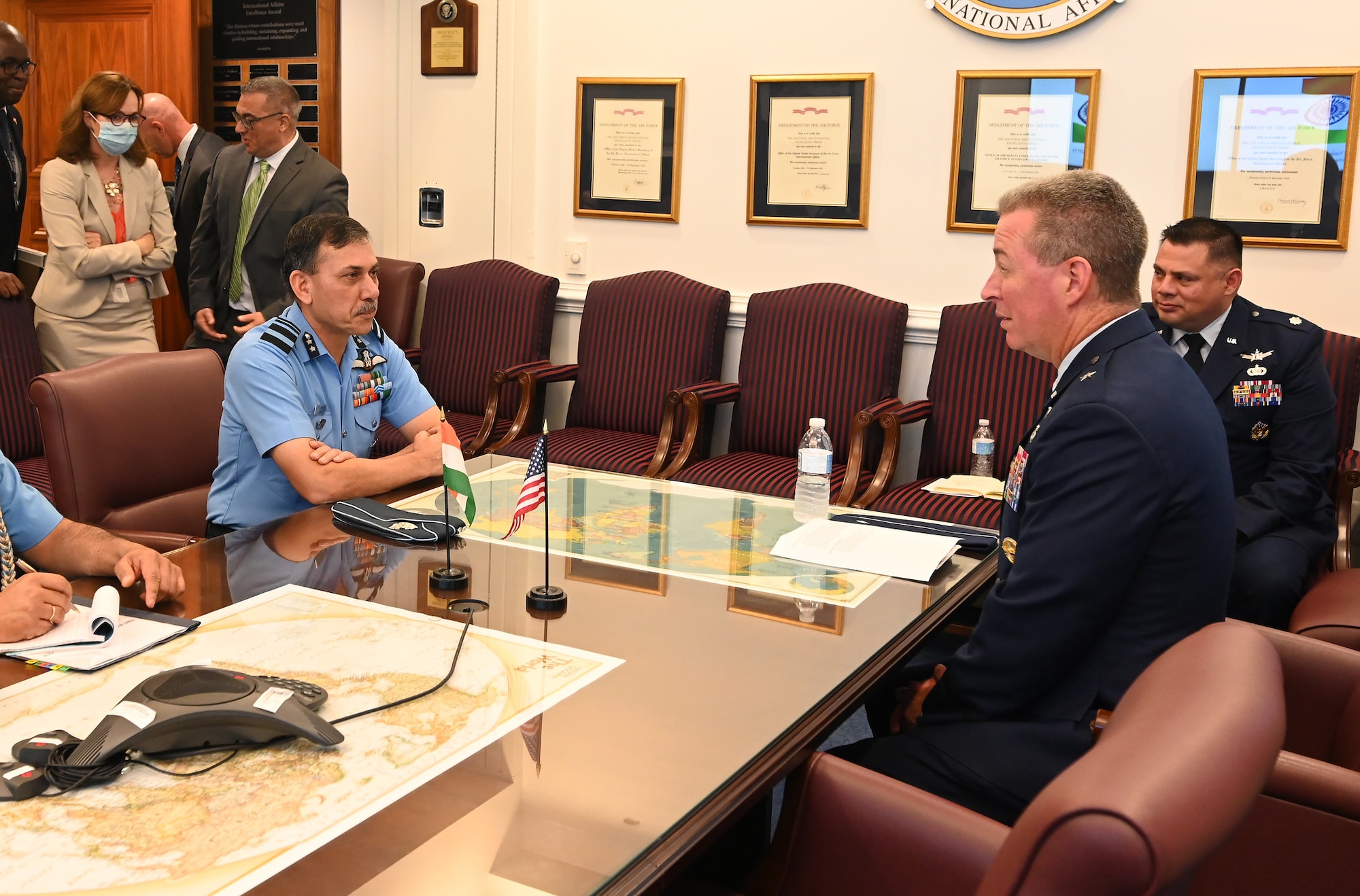 Brig. Gen. Brian Bruckbauer hosts an office call in honor of his fellow cochair of the US-India Defense Technology and Trade Initiative Air Vice Marshal Narmdeshwar Tiwari in the Pentagon, Arlington, Va., July 16, 2021. (U.S Air Force photo by Andy Morataya)