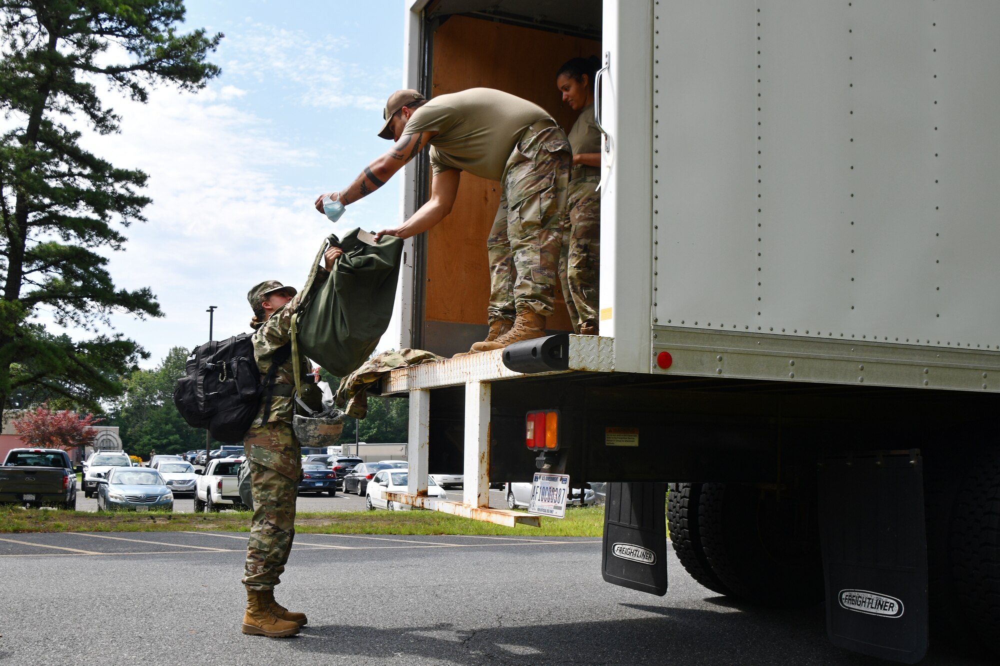 104th Fighter Wing Airmen perform a bag drop during a mobility exercise August 14, 2021, at Barnes Air National Guard Base, Massachusetts. Mobility exercises test the wing's ability to rapidly deploy aircraft, equipment, personnel and cargo. (U.S. Air National Guard photo by Staff Sgt. Hanna Smith)