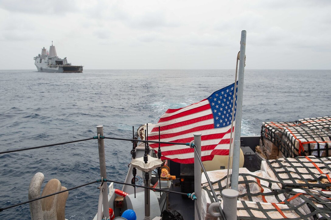 An LCU departs USS Arlington (LPD 24) to deliver food to the Port of Jérémie, Haiti in support of a USAID and Joint Task Force-Haiti humanitarian aid mission.