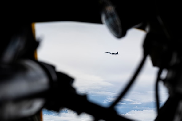 A U.S. Air Force F-15C Eagle, assigned to the 18th Wing, Kadena Air Base, Japan, escorts a U.S. Air Force B-52H Stratofortress, assigned to the 2nd Bomb Wing, Barksdale Air Force Base, Louisiana, during a Bomber Task Force mission over the Indo-Pacific region, Sep. 5, 2021. Evaluating readiness and forward positioning bomber aircraft ensures the Department of Defense can maintain operational and support capabilities to meet security obligations. (U.S. Air Force photo by Staff Sgt. Devin M. Rumbaugh)