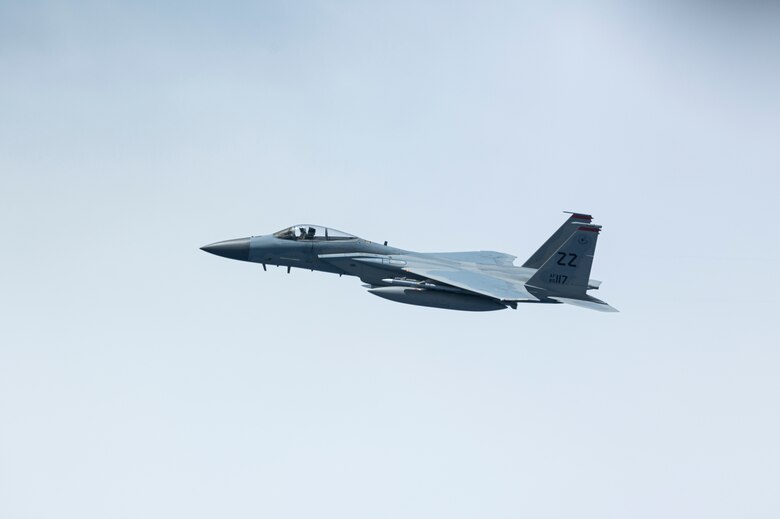 A U.S. Air Force F-15C Eagle, assigned to the 18th Wing, Kadena Air Base, Japan, escorts a U.S. Air Force B-52H Stratofortress, assigned to the 2nd Bomb Wing, Barksdale Air Force Base, Louisiana, during a Bomber Task Force mission over the Indo-Pacific region, Sep. 5, 2021. This deployment allows aircrew and support personnel to conduct theater integration and to improve bomber interoperability with allies and partners. (U.S. Air Force photo by Staff Sgt. Devin M. Rumbaugh)