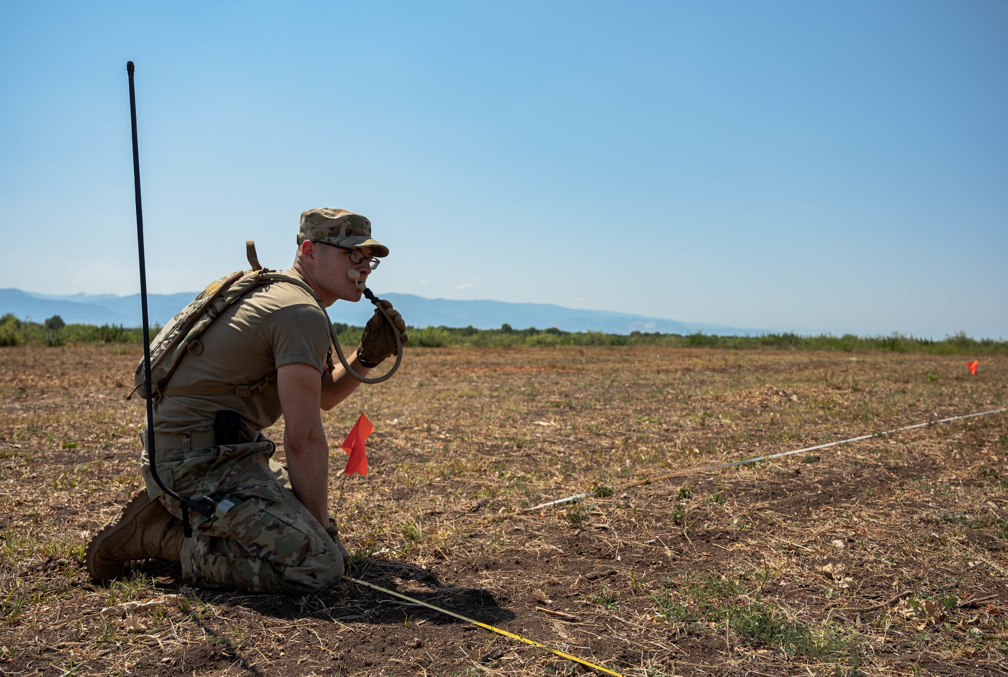 Airman takes water break.