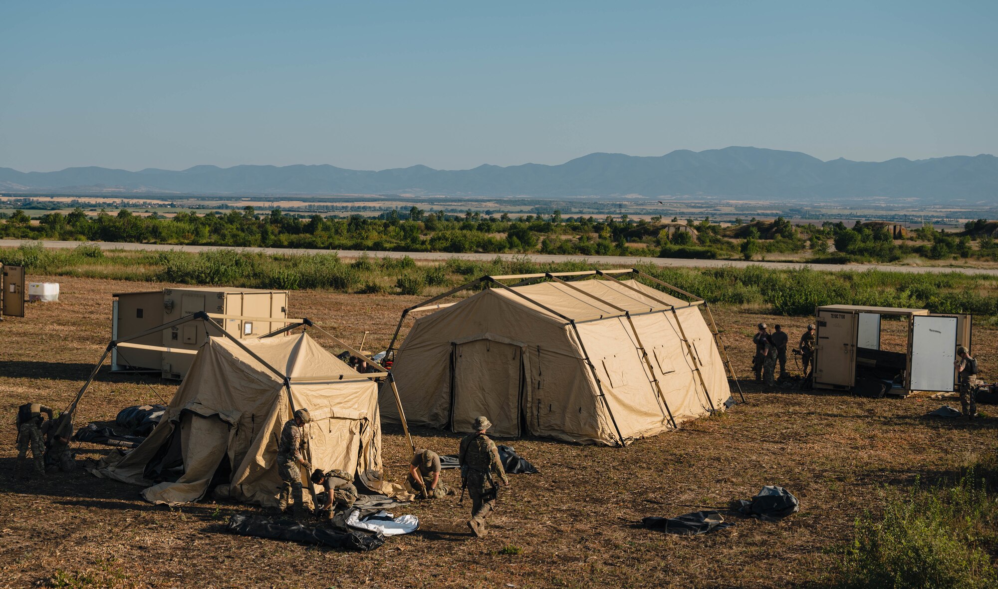Airman walks around camp.