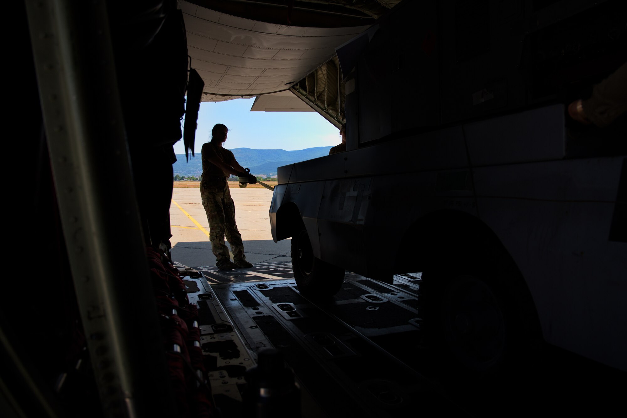 Airman offloads cargo.