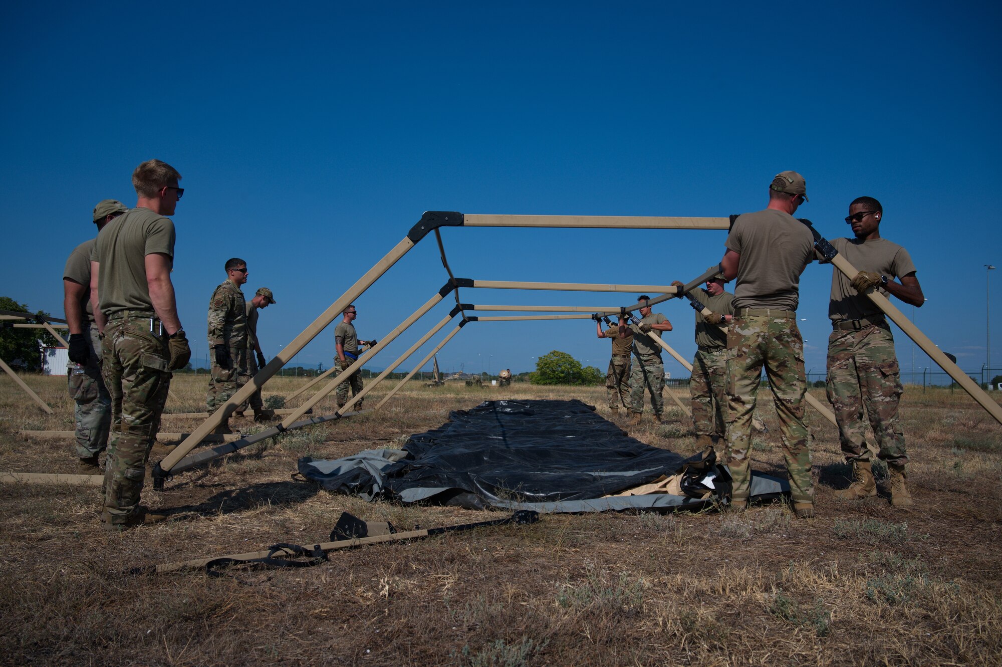 Airmen set up camp.