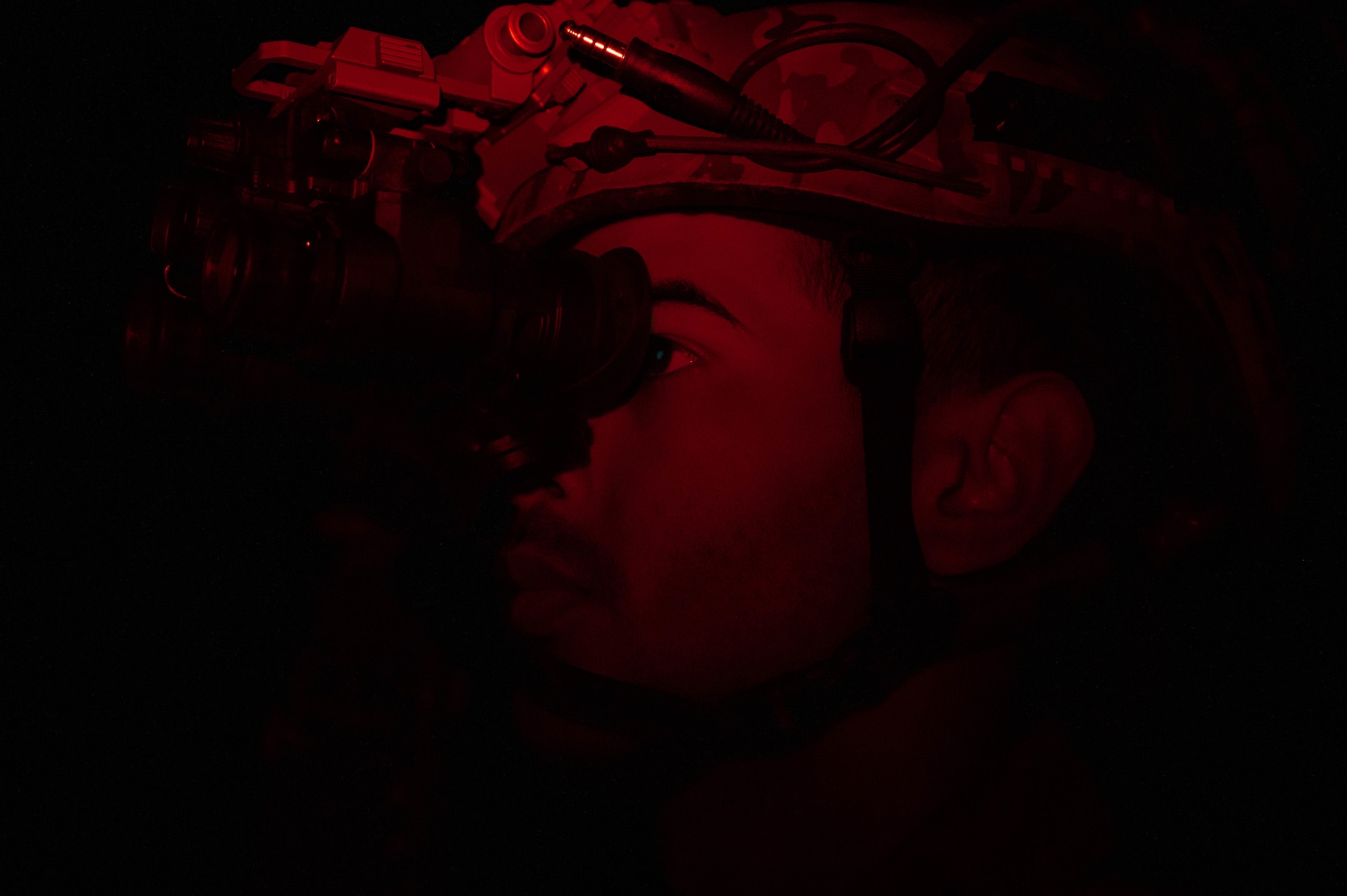 Airman utilizes night vision goggles during exercise.