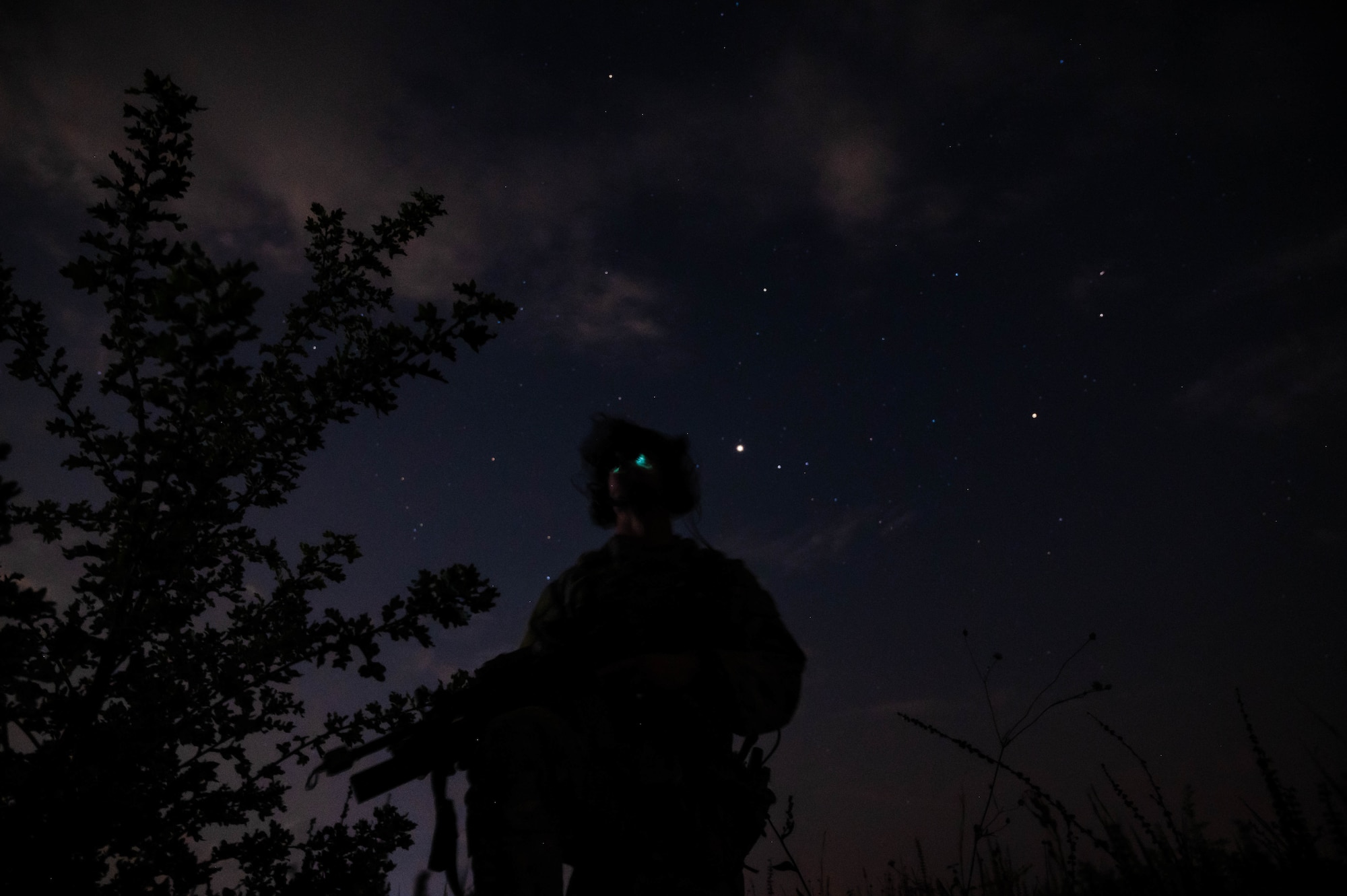 Airman kneels during exercise formation.