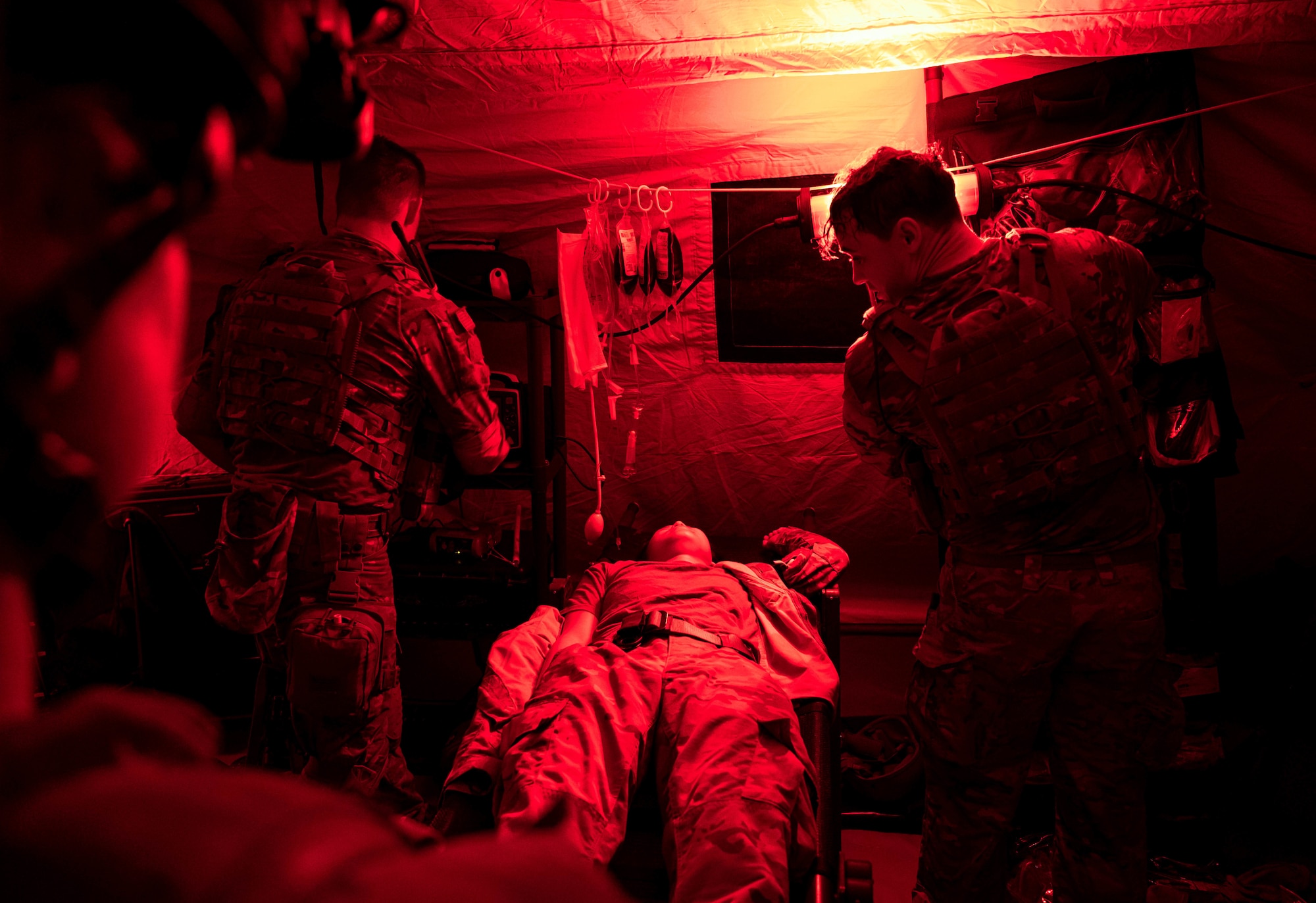 Airmen respond to simulated medical patient during exercise.