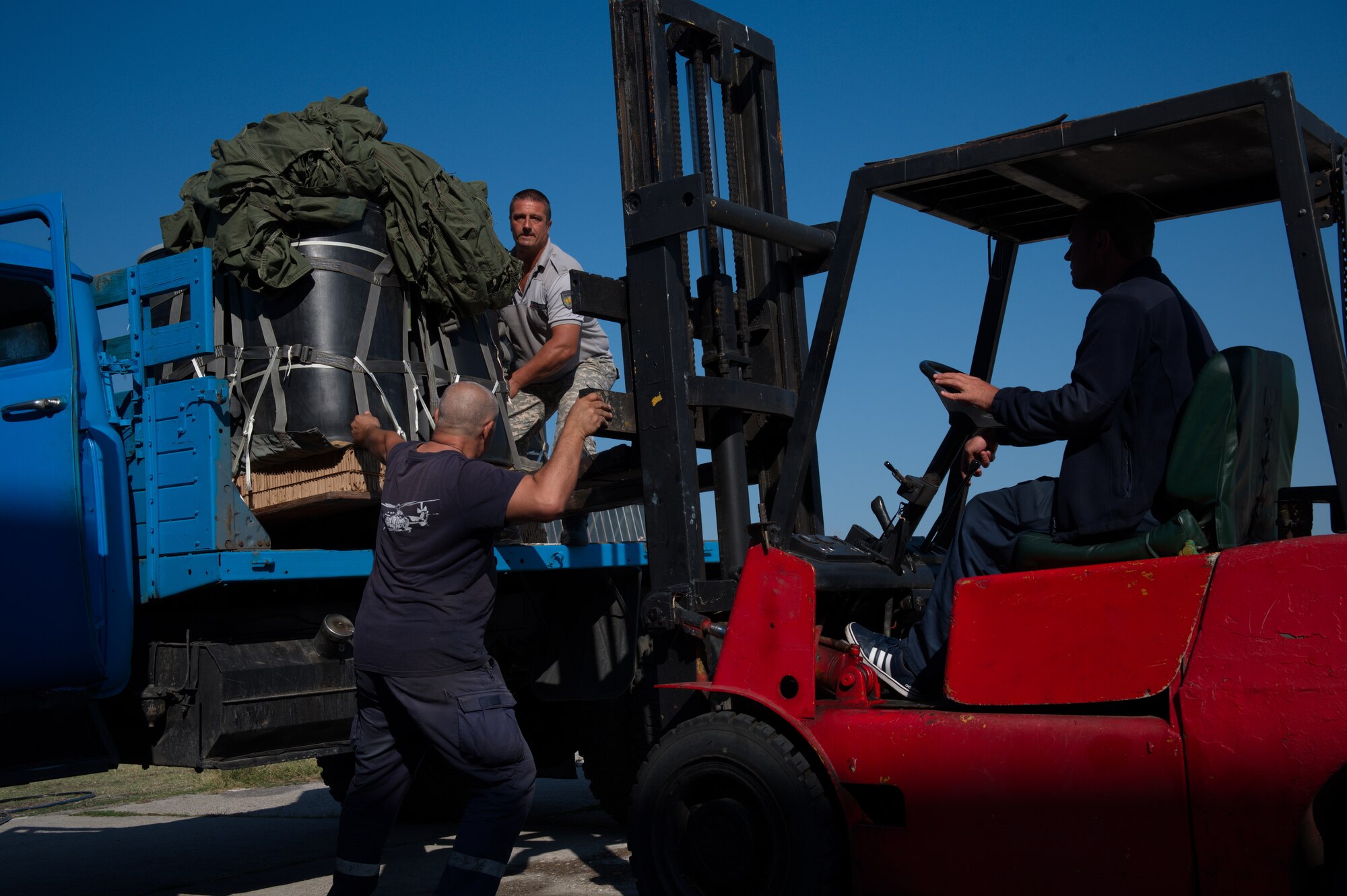 Bulgarian armed forces unload equipment.