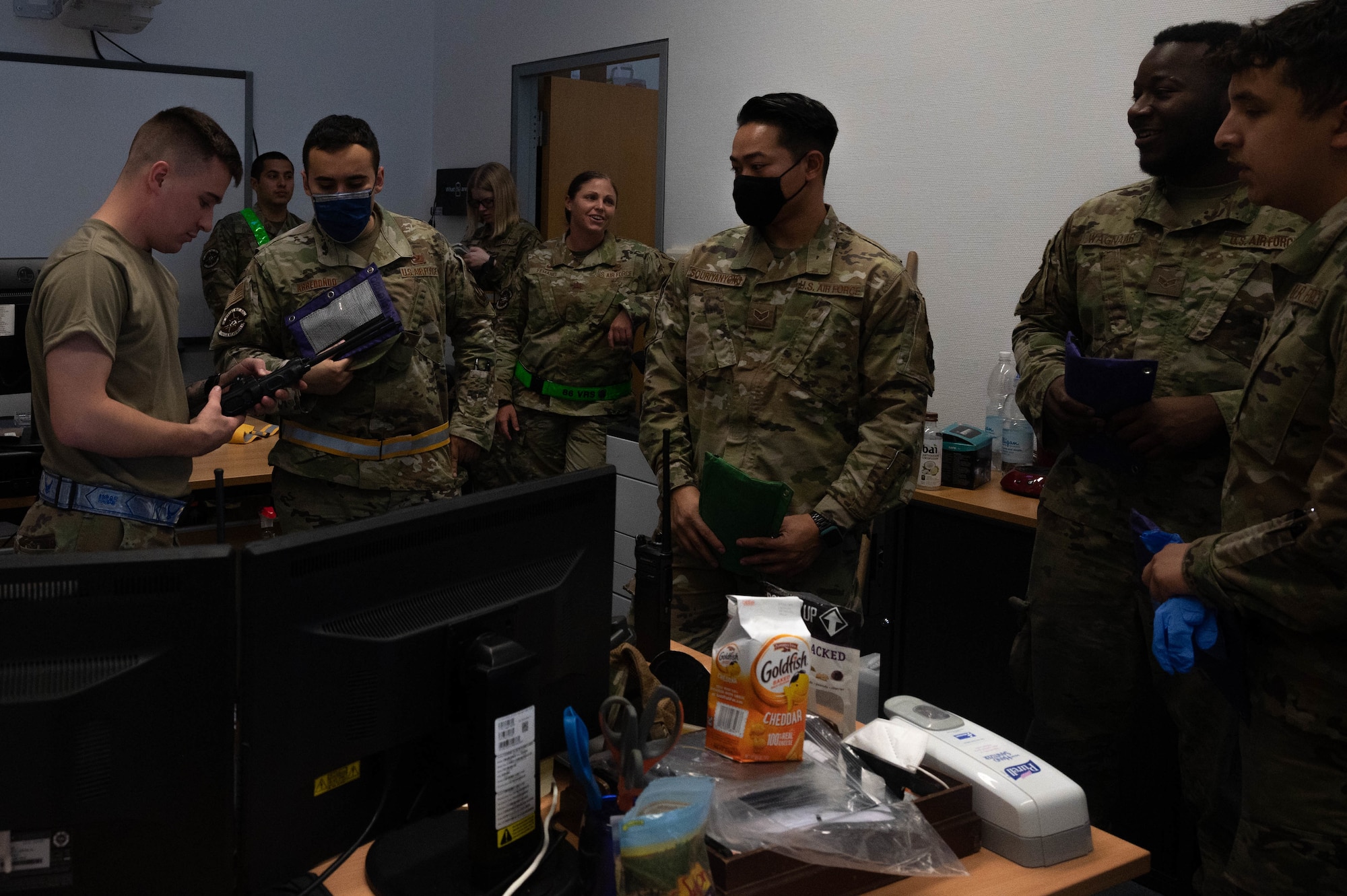 Airman distributes car keys.