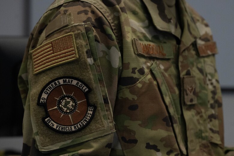 Airman poses for photo.