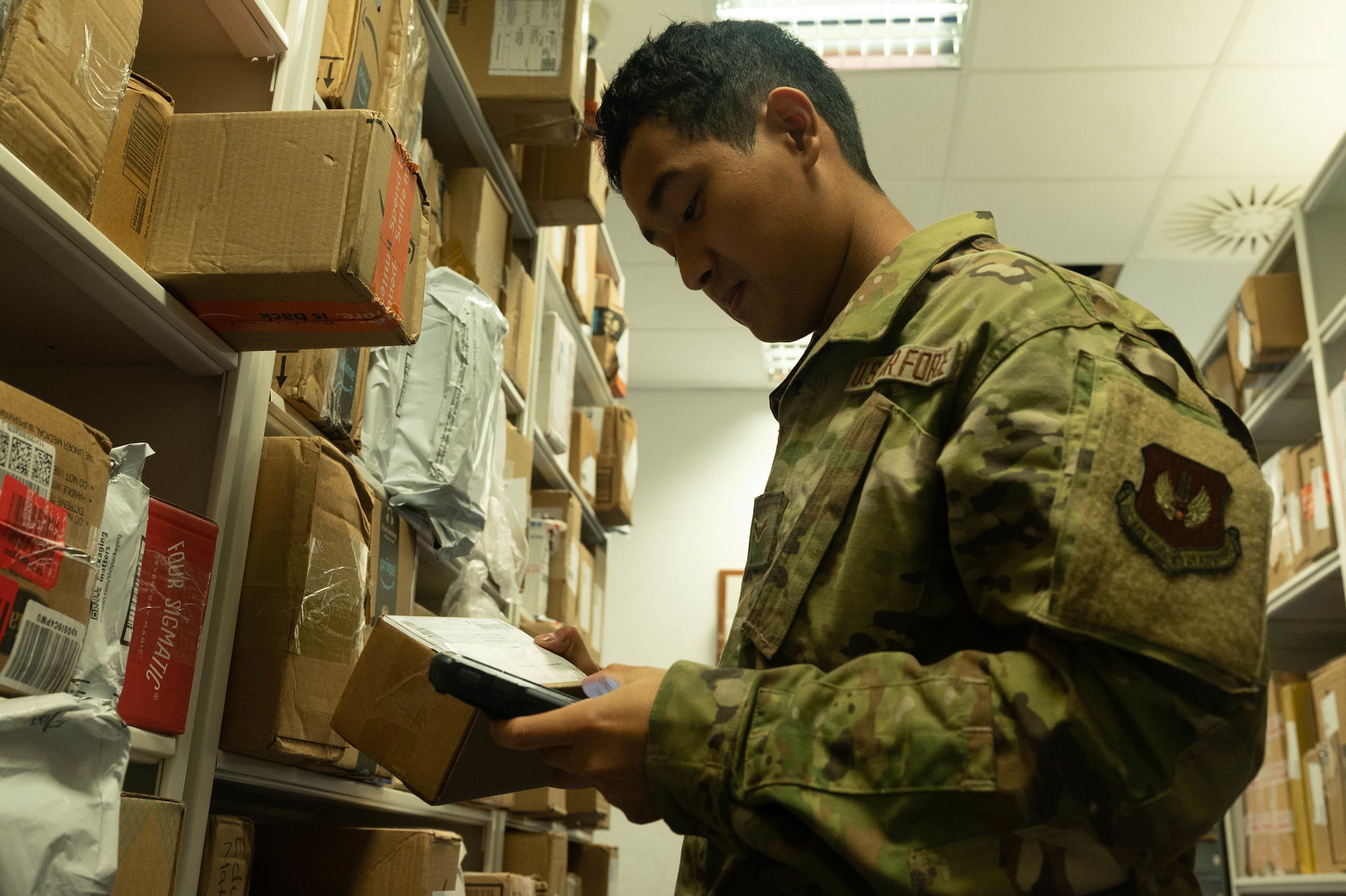 Airman sorts through maIl.