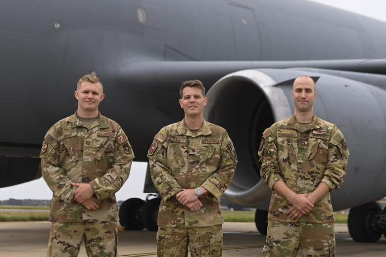 U.S. Air Force Capt. Cameron Sperry, 9th Air Refueling Squadron pilot, left, Maj. Gary Sain, 9th ARS pilot, center, and Capt. Judah Hooper, 9th ARS pilot, flew missions in support of Operation Allies Refuge from Royal Air Force Mildenhall, England. The crew assisted in the evacuation of eligible foreigners and vulnerable Afghans. (U.S. Air Force photo by Senior Airman Joseph Barron)