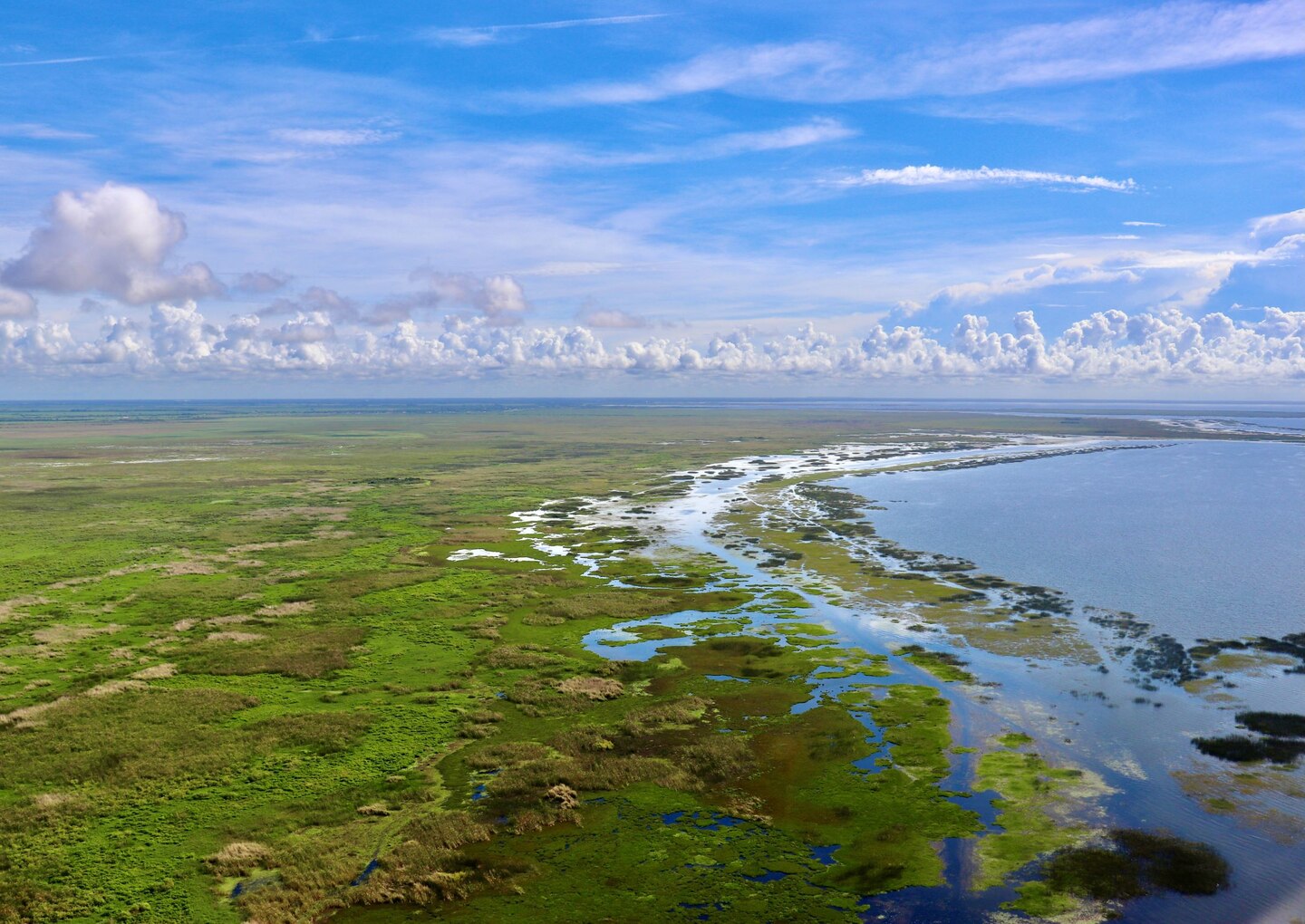 A ring of clouds often surrounds Lake Okeechobee on summer days