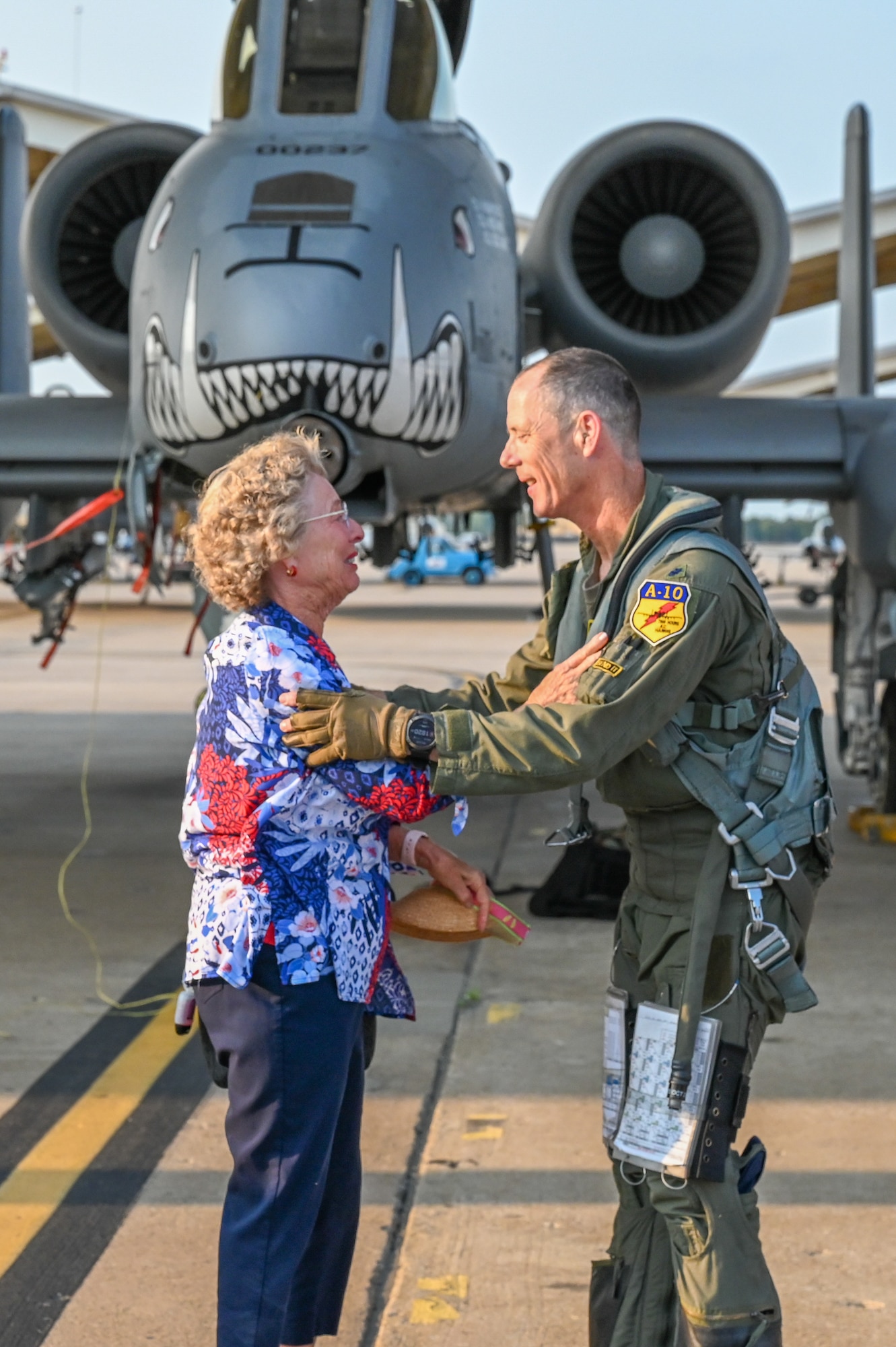 Lt. Col. John “Karl” Marks embraces his mom who was able to celebrate his 7,000 hour milestone, as well as his 6,000 hour milestone of flying the A-10C Thunderbolt II on Sept. 1, 2021 at Whiteman AFB, Mo.