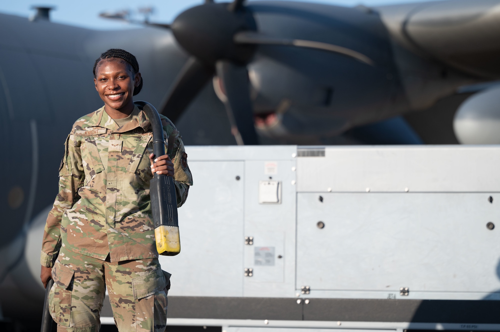 Environmental portrait featuring an aircraft maintainer.