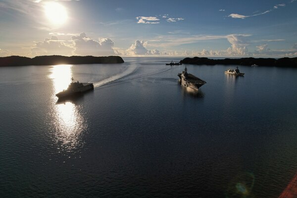 USS Jackson (LCS 6) sails alongside the Japan Maritime Self-Defense Force the Izumo-class helicopter destroyer JS Kaga (DDH 184), and other Japan ships through the Malakal Passage, Republic of Palau, Sept. 2, 2021.