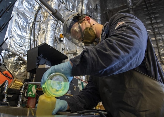 PALAU (Sept. 3, 2021) Electrician’s Mate 1st Class Chance Emerson, from Denver, Colo., tests fuel in the oil lab aboard Independence-variant littoral combat ship USS Jackson (LCS 6). Jackson, part of Destroyer Squadron Seven, is on a rotational deployment in the U.S. 7th Fleet area of operation to enhance interoperability with partners and serve as a ready-response force in support of a free and open Indo-Pacific region. (U.S. Navy photo by Mass Communication Specialist 3rd Class Kelsey S. Culbertson)